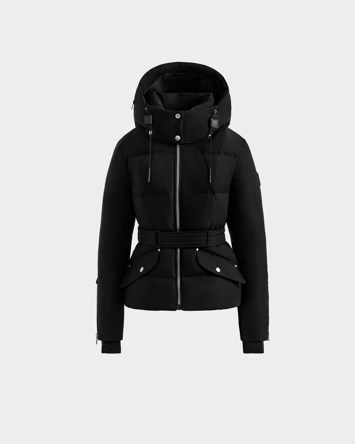 The ADELINE H - 8125587 Black by Rudsak is a black women's fitted down puffer with hood, belted waist, front zipper, snap buttons, flap pockets, and adjustable drawstrings, shown on a light grey background.