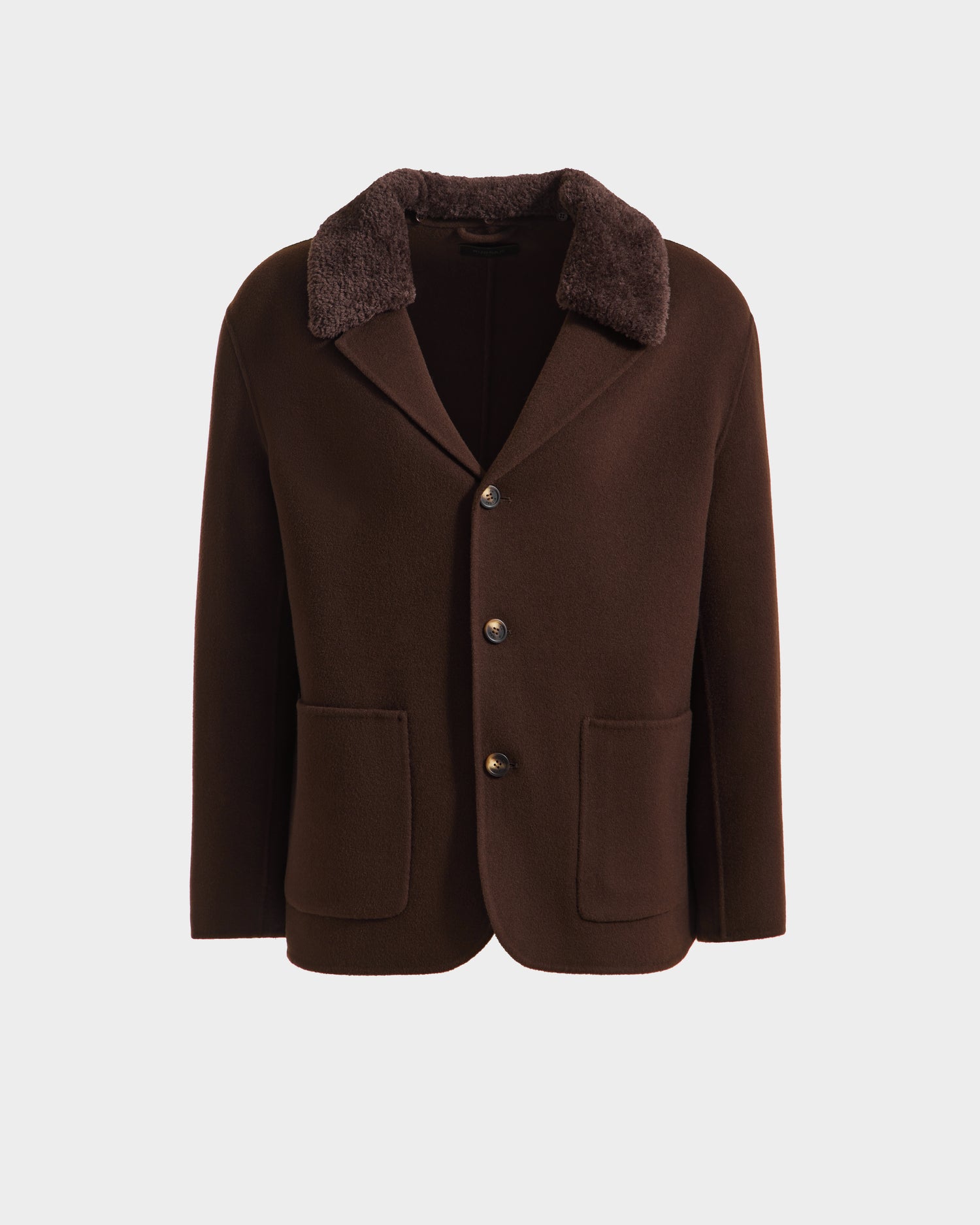 The Rudsak AIDEN - 6125558 Espresso is a men’s brown wool-blend coat with a removable faux shearling collar, three front buttons, and two large pockets, shown against a plain white background.