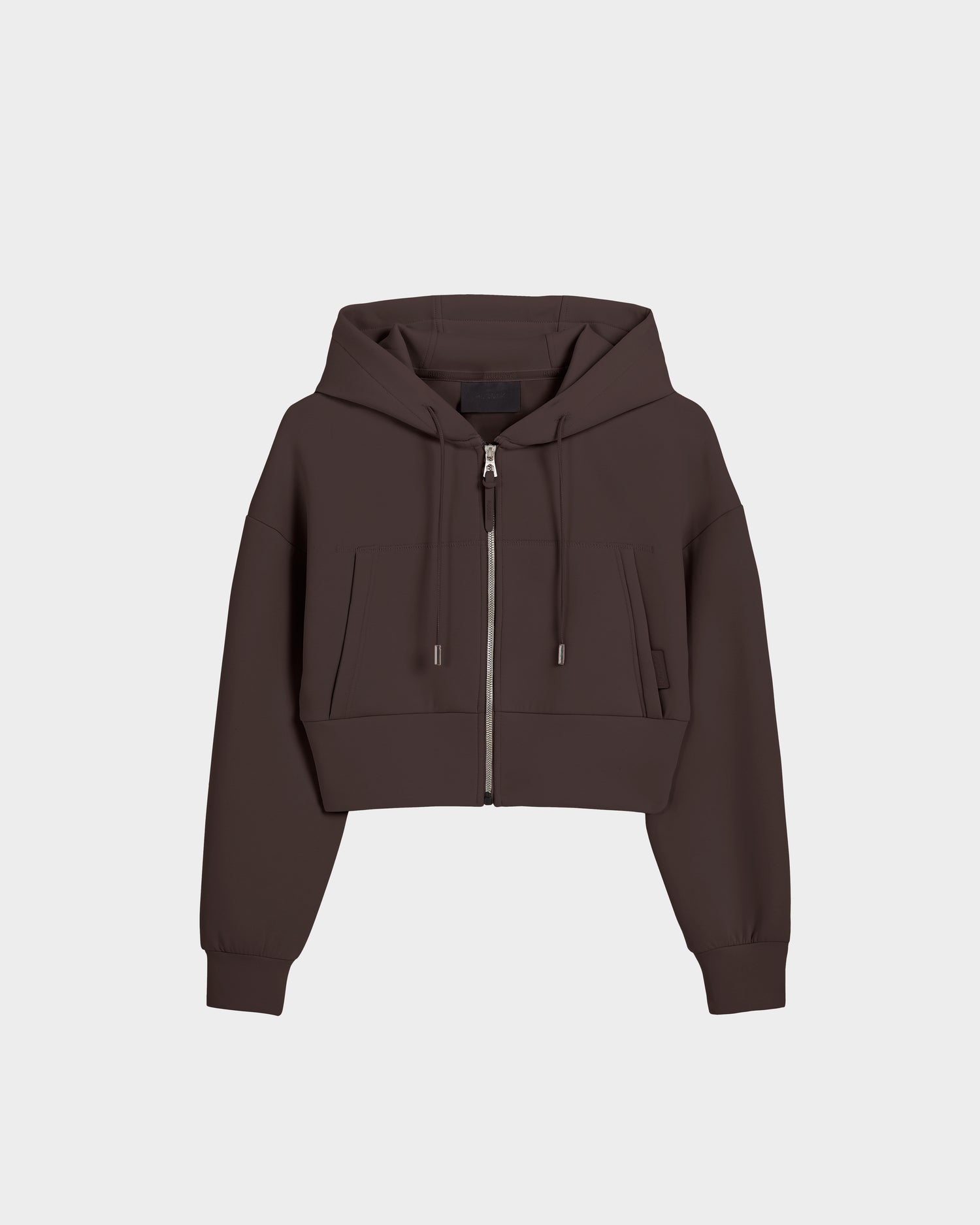 The Rudsak ALAYA - 8525038 Espresso is a dark brown womens cropped zip-up hoodie with a hood, drawstrings, long sleeves, and two front pockets, shown on a plain white background—ideal for casual-chic loungewear.