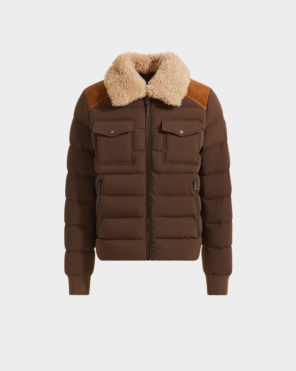 The Rudsak ANTHONY - 6125042 Mocha men’s aviator jacket features a front zipper, chest flap pockets, side zip pockets, removable shearling collar, ribbed cuffs and hem, suede-like shoulder accents, and classic quilted styling.