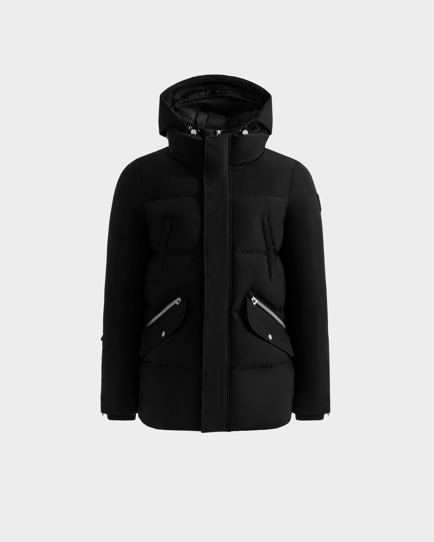 The Rudsak APOLLO - 6125693 Black hooded winter jacket is displayed on a plain light gray background. It features two front zippered pockets with flaps and a high collar.