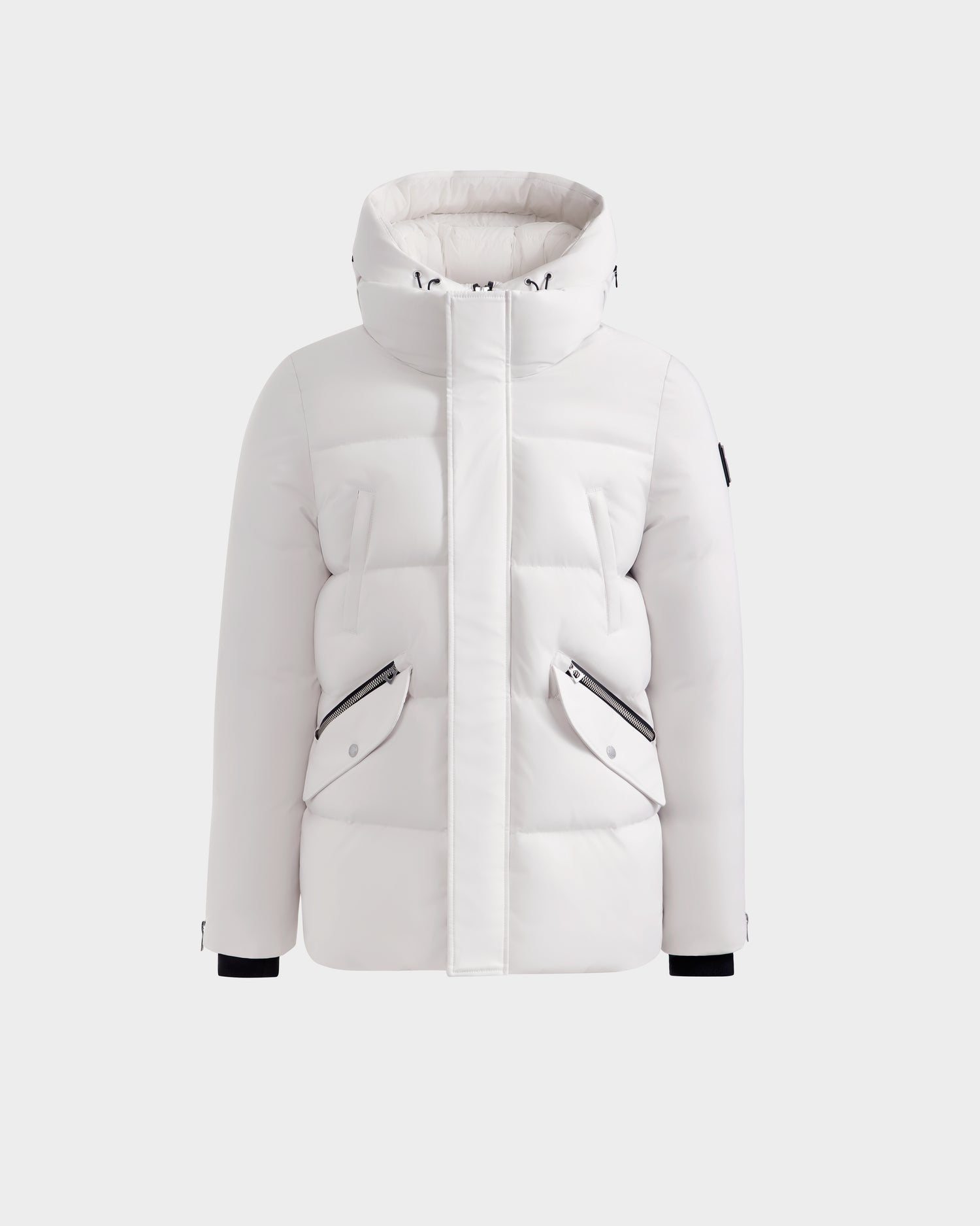 The APOLLO H - 6125690 Vanilla by Rudsak is a white quilted puffer parka with a high collar, hood, front zip closure, two zippered flap pockets, and black cuff accents, shown on a plain light gray background.
