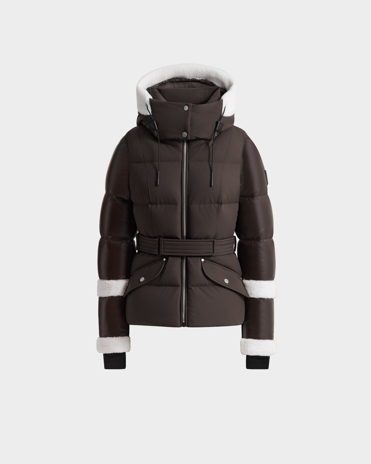 The Rudsak AUDREY - 8124582 Espresso is a dark brown, belted puffer jacket in recycled Stormshell fabric with a high collar, hood, and white shearling trim on the hood and sleeves, shown on a plain white background.