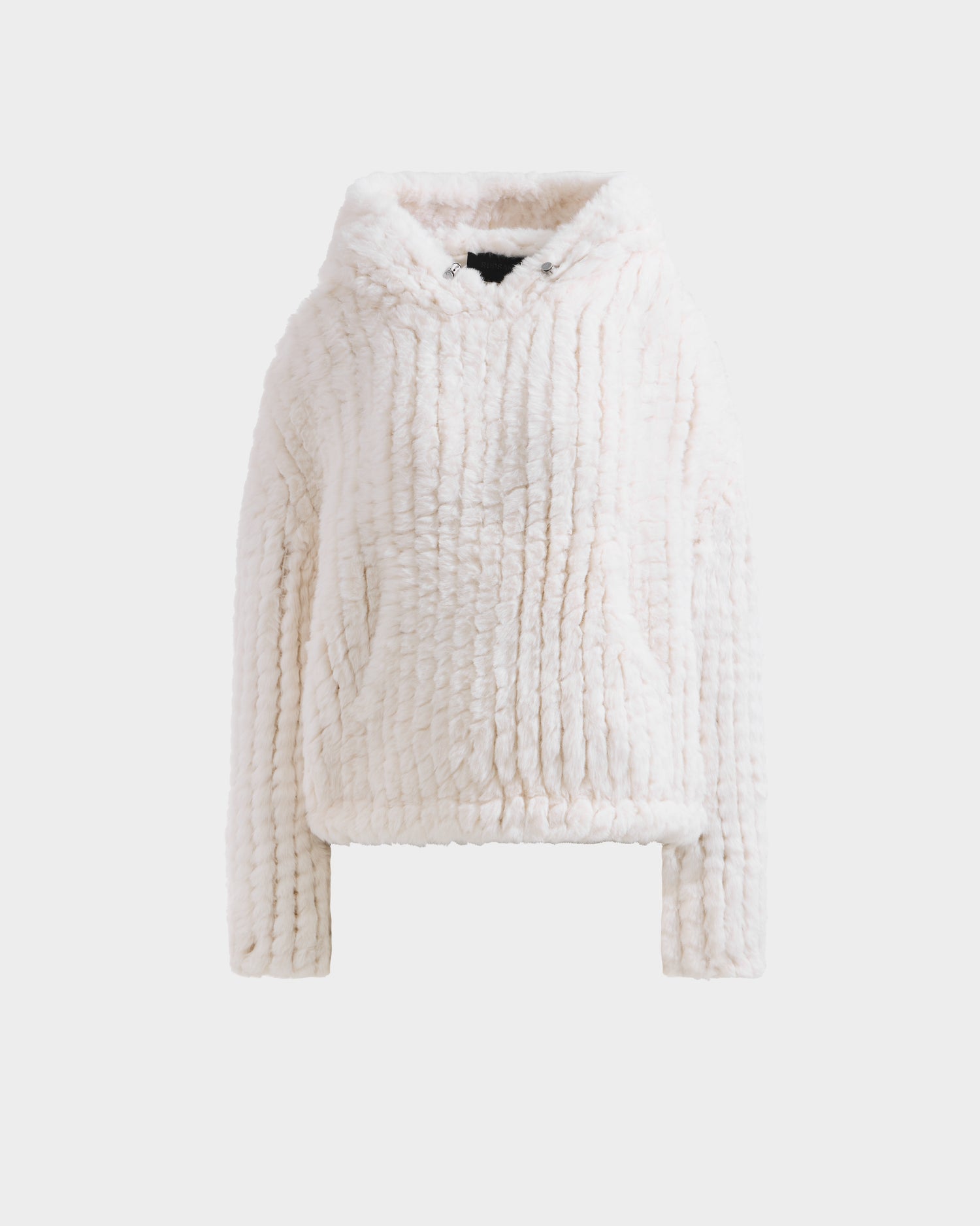 The Rudsak AUGUST - 8525658 Iceland is a soft, plush white faux fur hoodie with long sleeves, relaxed fit, and drawstring hood—ideal for après-ski or winter lounging—shown on a plain white background.