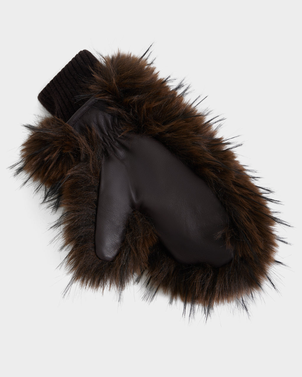 The BELLA - 8425006 Mix Espresso mitten by Rudsak features rich brown leather, a plush dark brown faux fur trim, and a ribbed knit cuff. Displayed on a plain white background, this cozy après-ski accessory is the perfect addition to your winter glove collection.