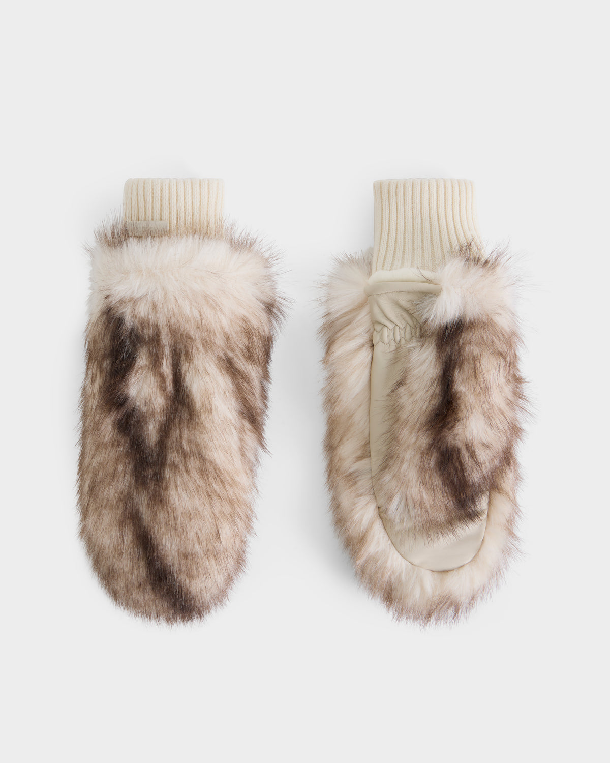 A pair of Rudsak BELLA - 8425006 Mix Vanilla faux fur mittens with cream-colored knit cuffs and a soft exterior in shades of brown and beige, perfect for adding cozy style to your winter accessories collection, displayed on a white background.