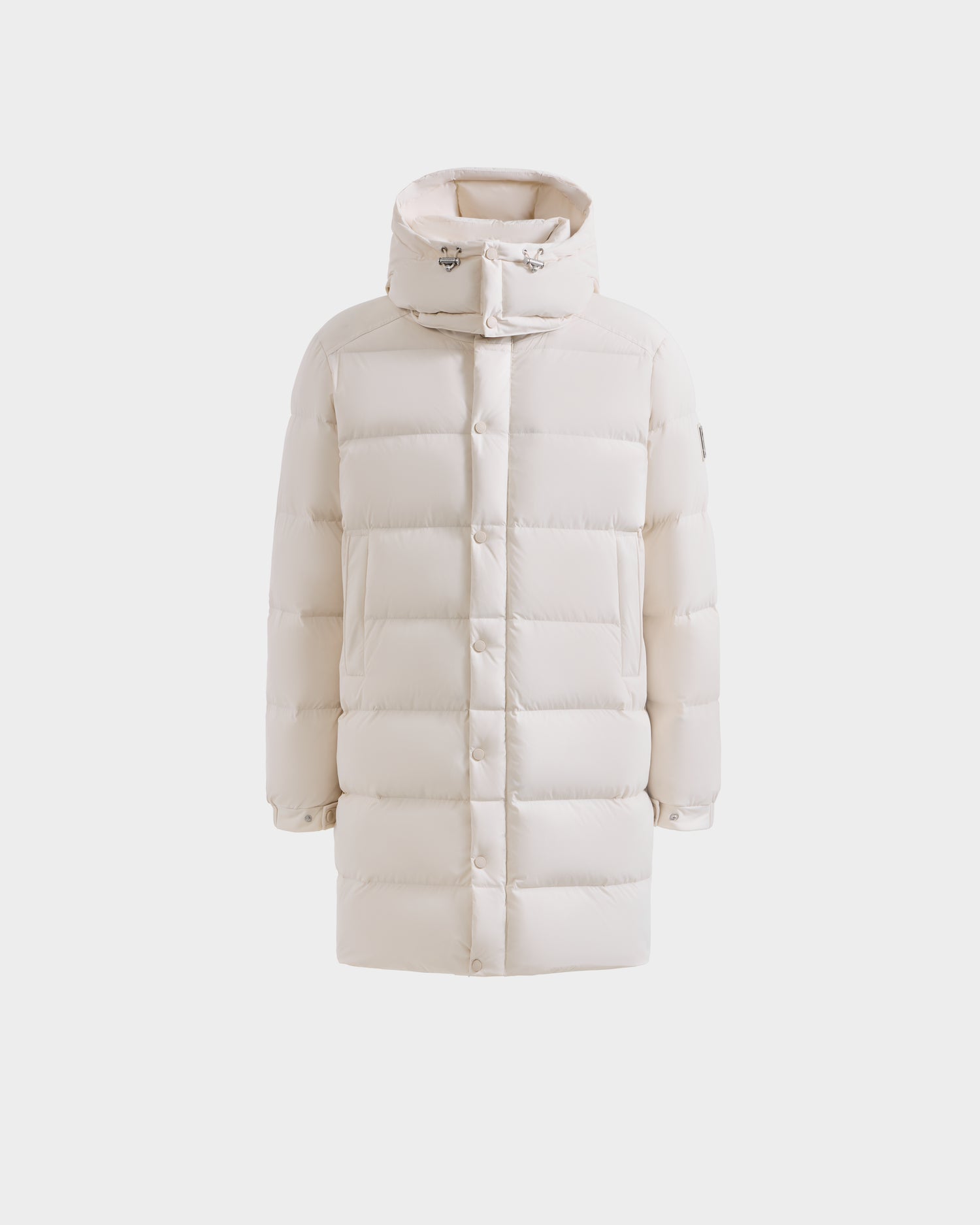 The Rudsak BRAYDEN M-M - M125535 Vanilla is a white men's down puffer jacket with horizontal quilting, high collar, hood, snap buttons, and side pockets, shown on a plain white background.