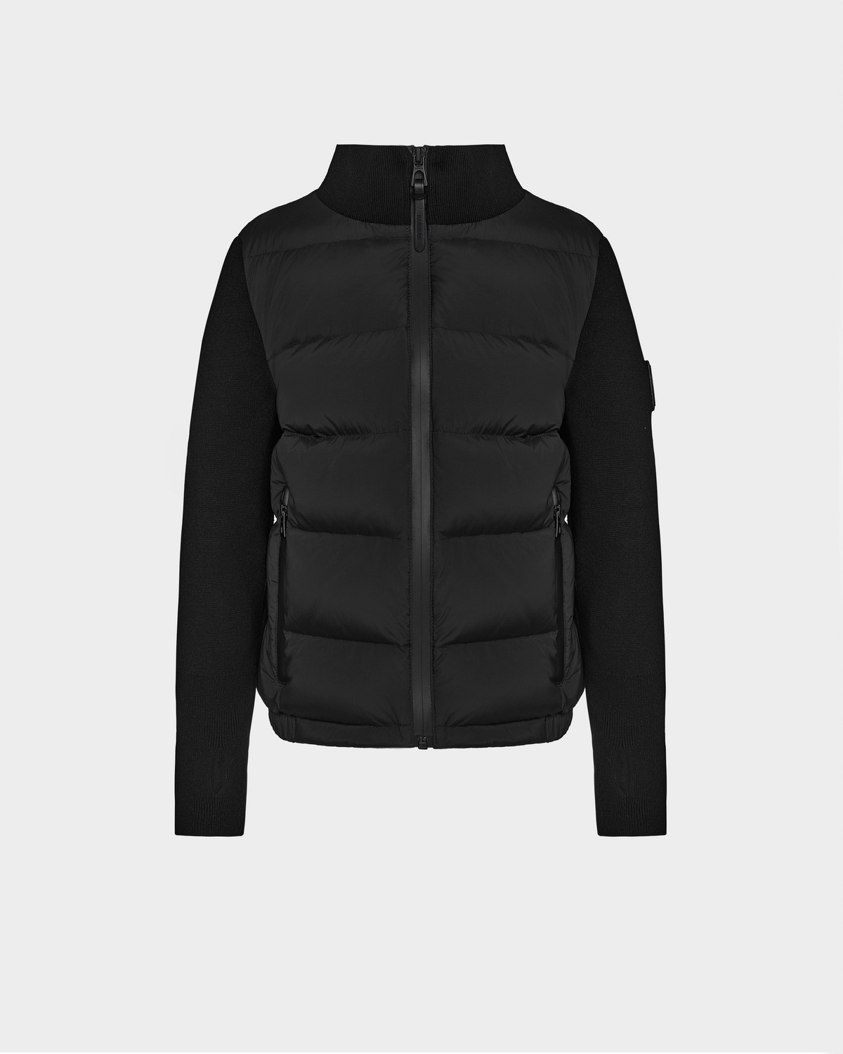 The Rudsak CAMILLE HV - H125500 Black puffer jacket features a front zipper, high collar, and knit sleeves. With a quilted, padded body for warmth and structure, this jacket is displayed on a plain white background.