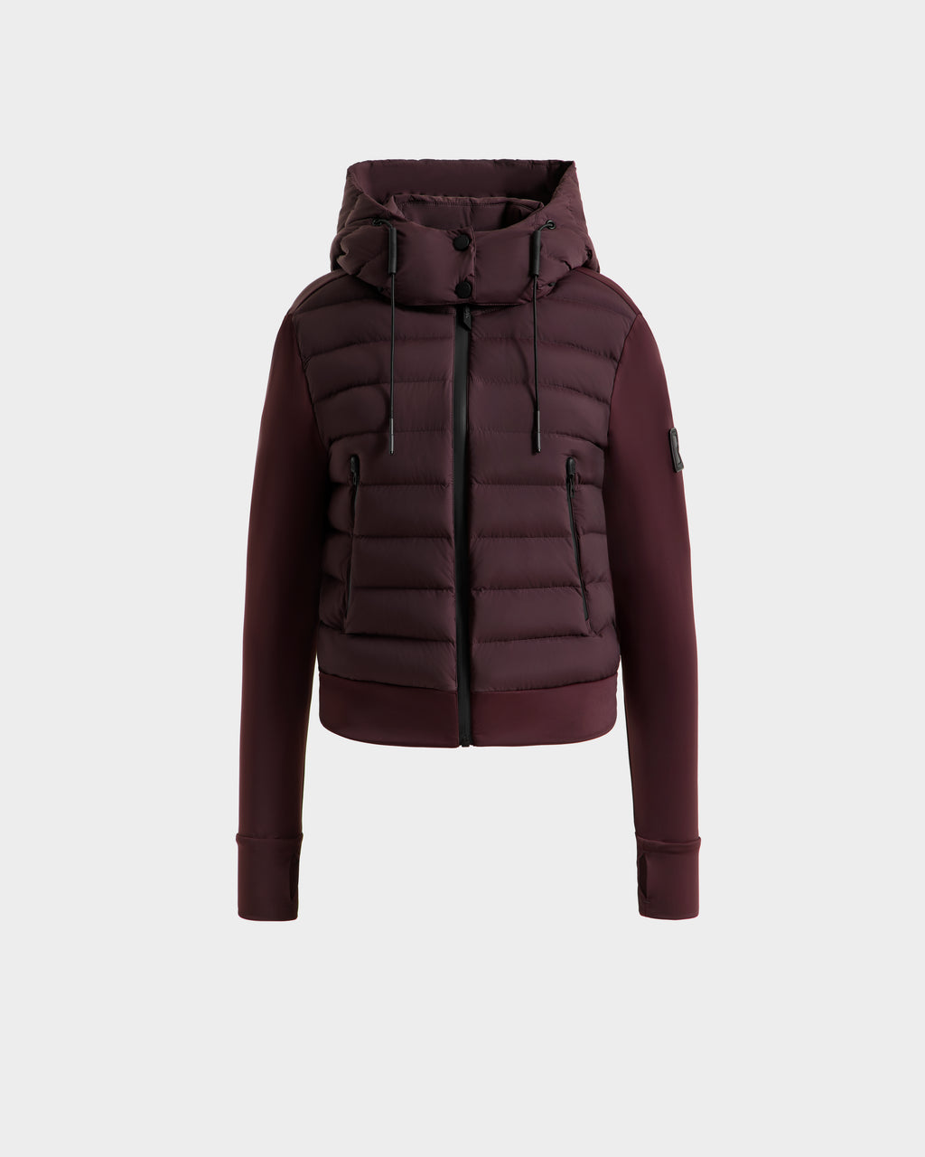 The Rudsak CASSA - 8125057 Bordeaux women's jacket features a hood, front zipper, and side pockets. Displayed on a plain light gray background, this lightweight cropped jacket offers versatile style and practicality.