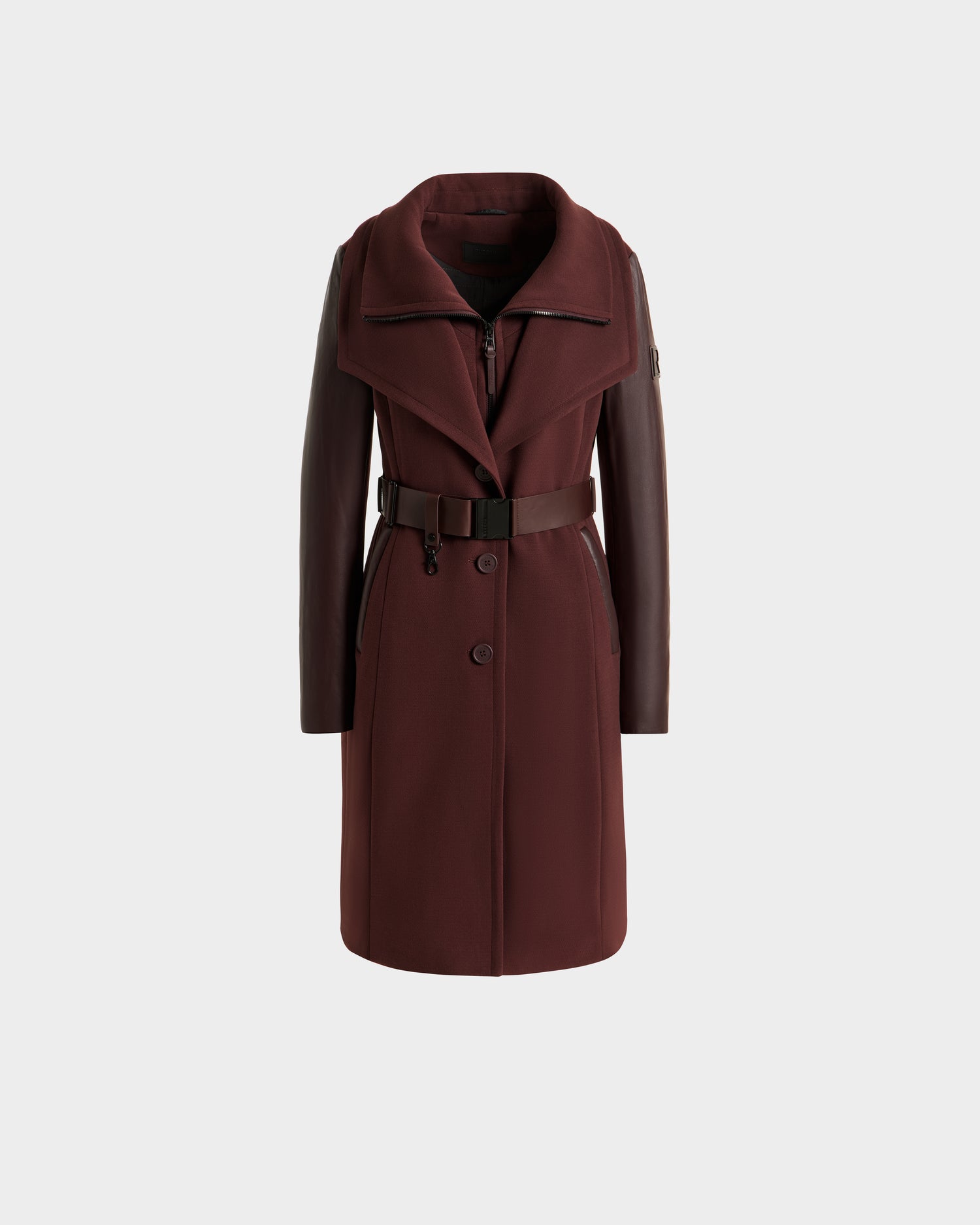 The CELESTE - L124542 Bordeaux by Rudsak is a modern transitional coat in rich burgundy with sleek leather sleeves, wide lapels, a belted waist, and button-down front, shown elegantly on a plain white background.
