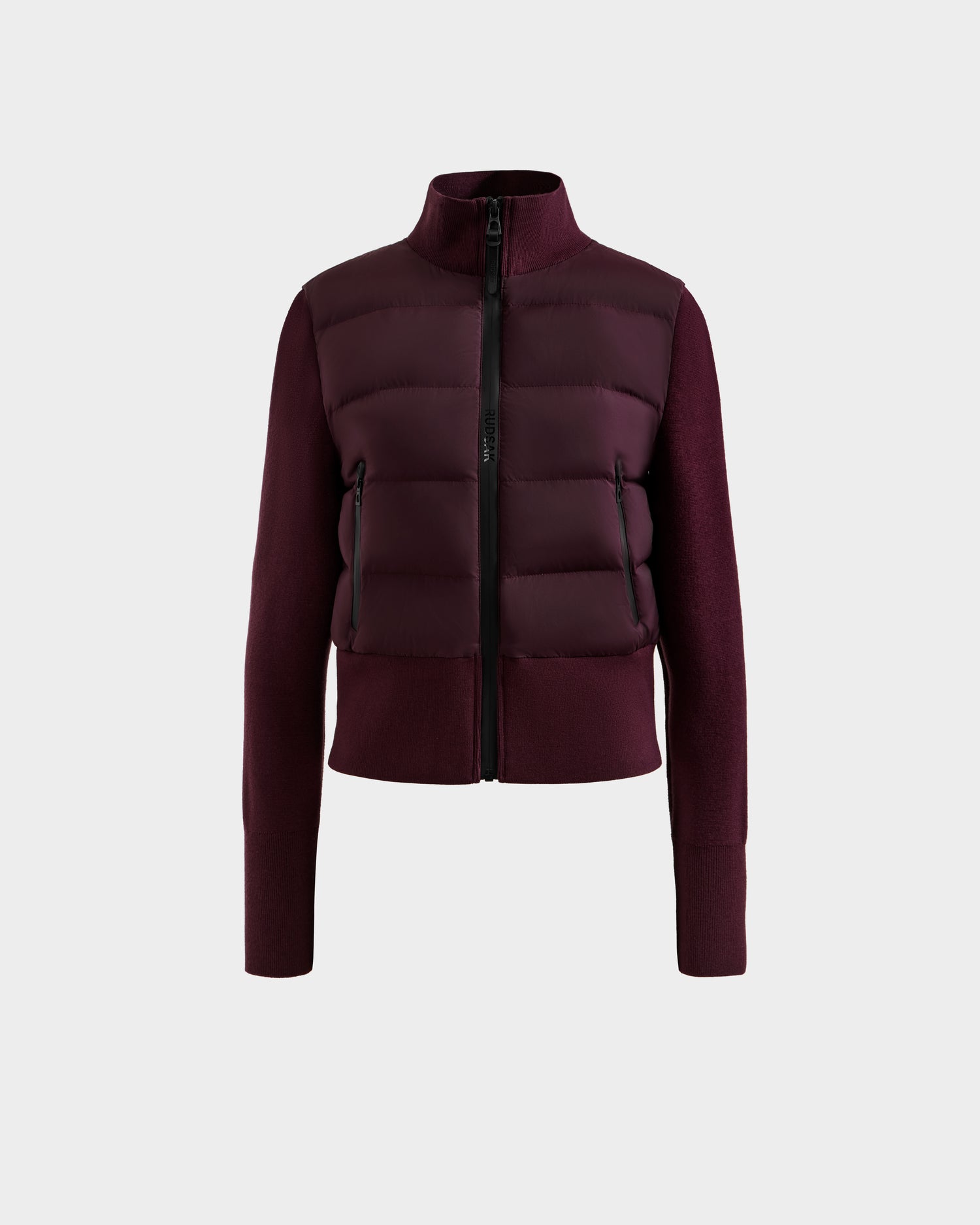 The Rudsak CLAREMONT - 8125502 Bordeaux is a maroon women's hybrid down jacket with a padded, quilted front, full sleeves, high collar, front zipper, and RDS-certified down, shown on a plain white background.