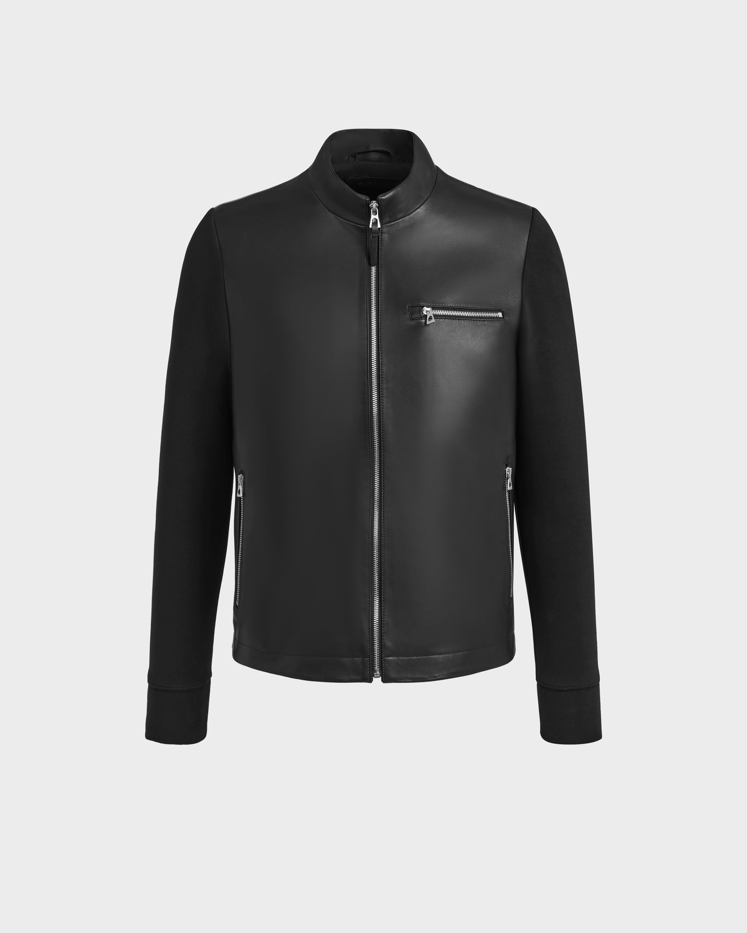 The Rudsak CLIFTON - 6125021 Black leather jacket features a mock-neck, front zipper, two zippered side pockets, and a zippered chest pocket, shown against a plain white background.