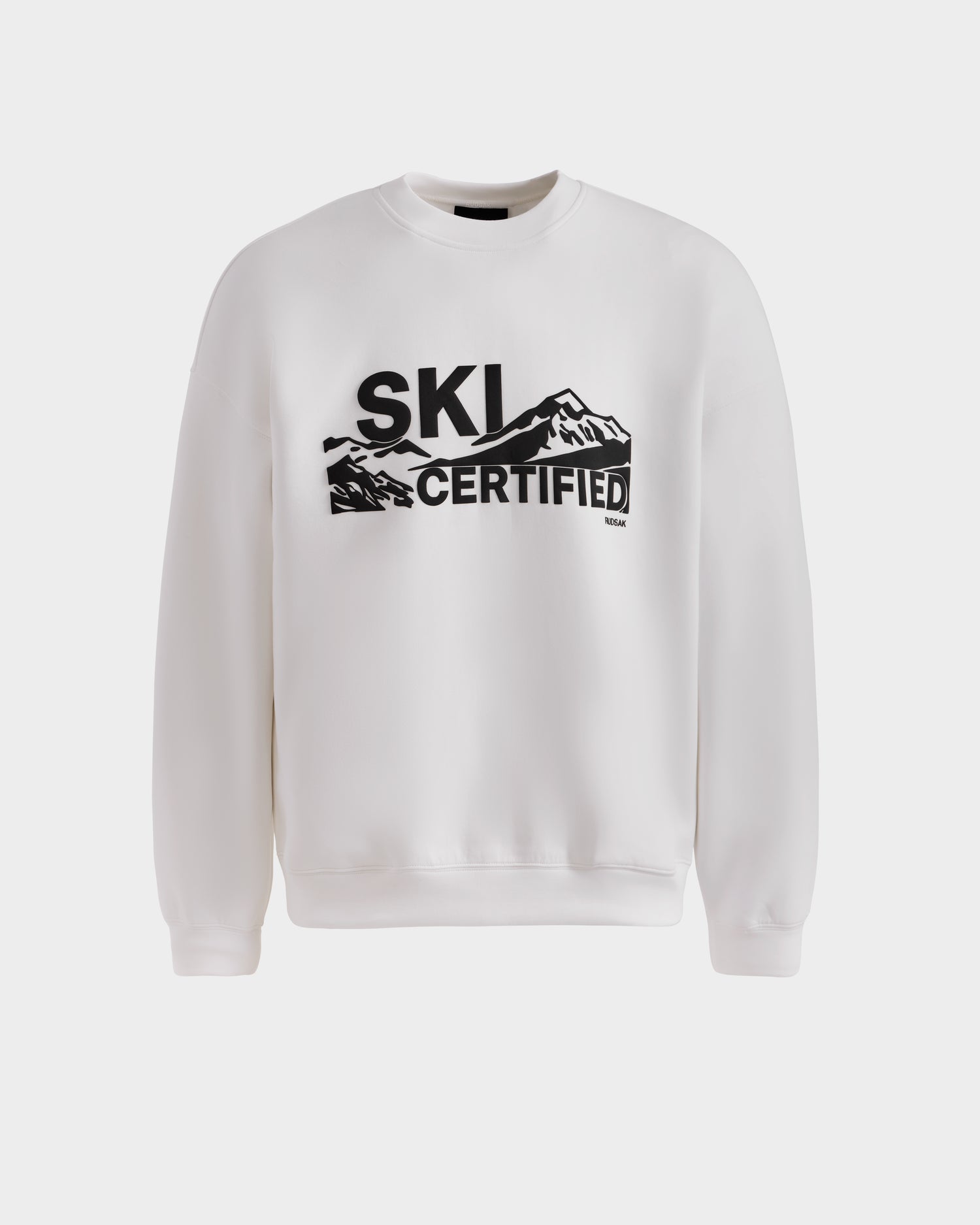 The DECLAN - 6525648 Iceland men’s crewneck sweatshirt by Rudsak features bold black “SKI CERTIFIED” lettering with mountain peak graphics integrated into the text for a standout look.