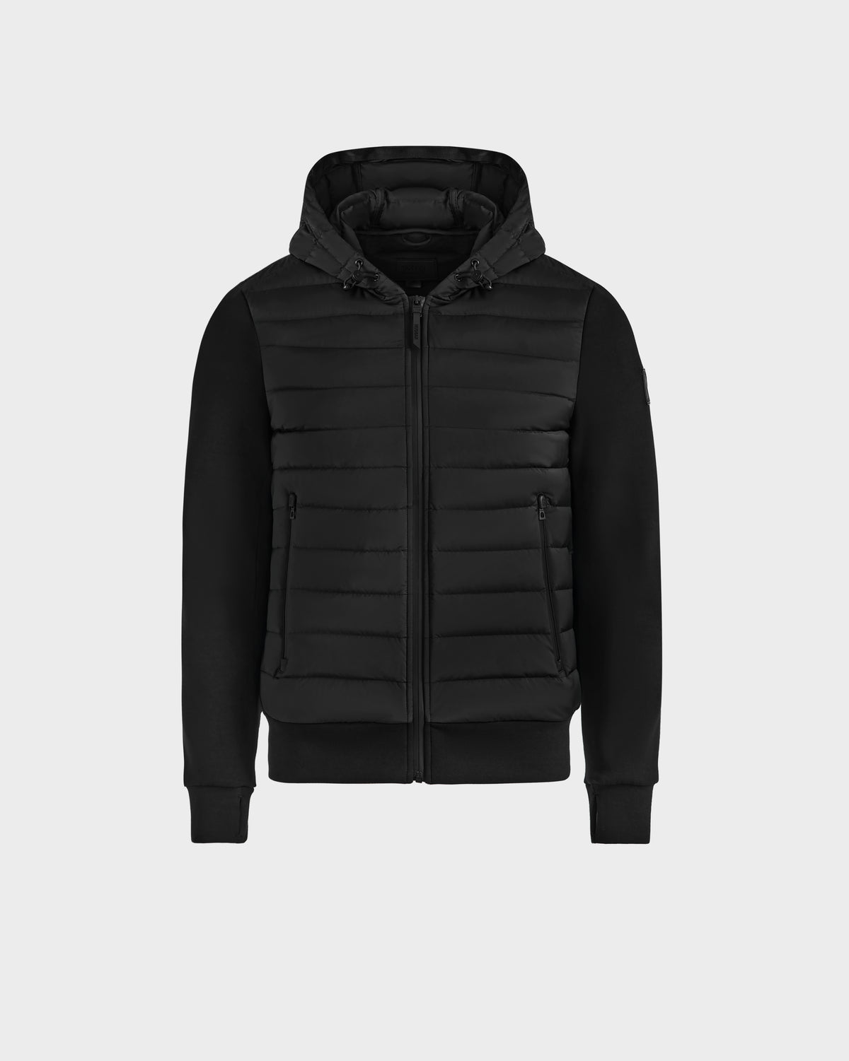 The Rudsak DEE MAT - 6124028 Black mens lightweight hybrid down jacket features a quilted front, zip-up closure, side pockets, and solid black sleeves, shown against a plain white background.