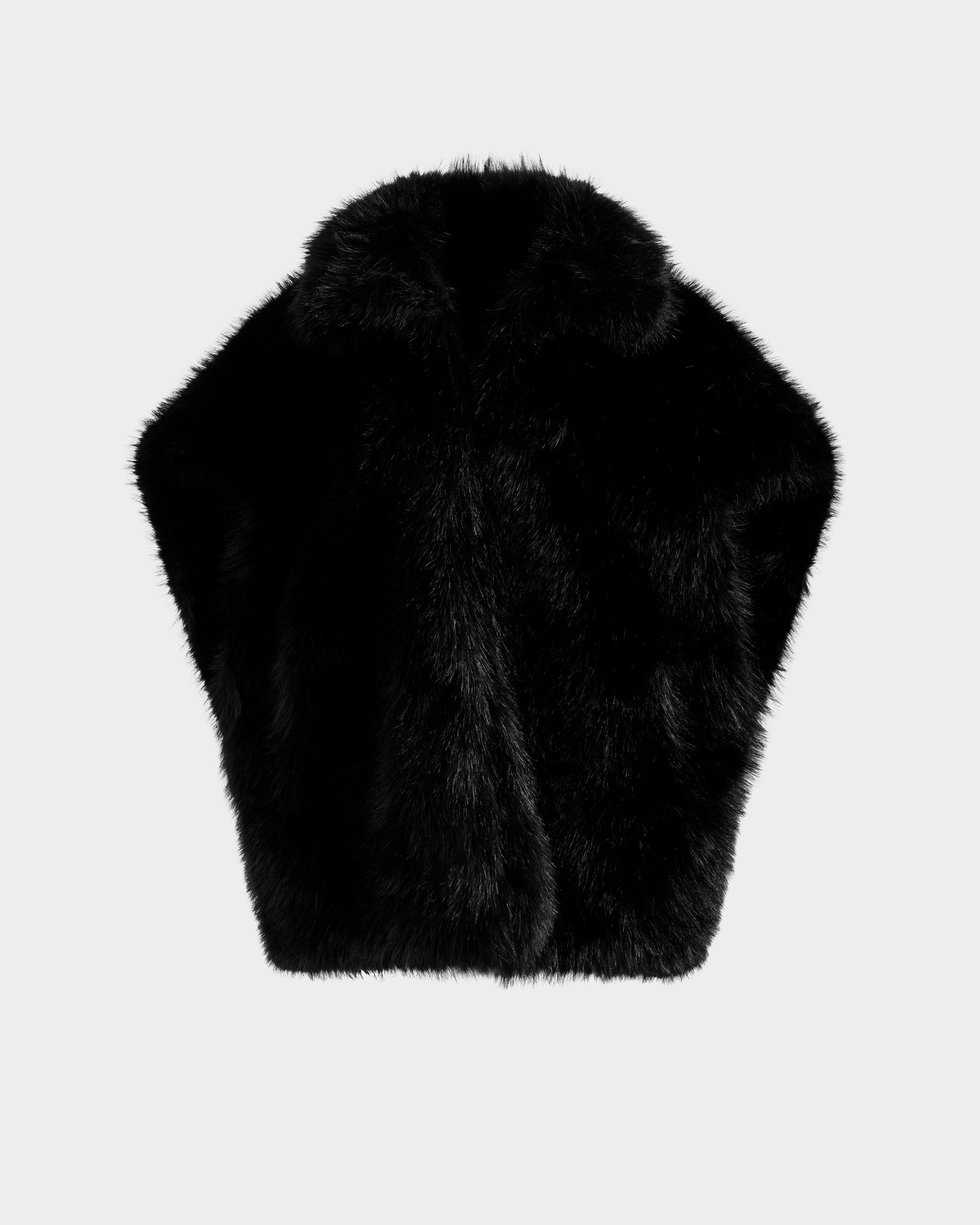 The Rudsak DELFINA - 8525662 Black faux fur vest features a plush, soft texture for versatile transitional styling, showcased against a plain light gray background.