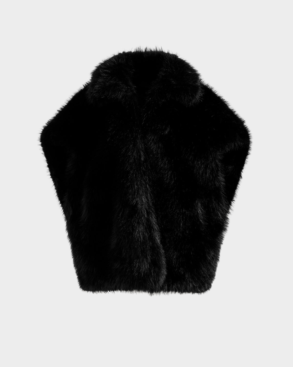 The Rudsak DELFINA - 8525662 Black faux fur vest features a plush, soft texture for versatile transitional styling, showcased against a plain light gray background.