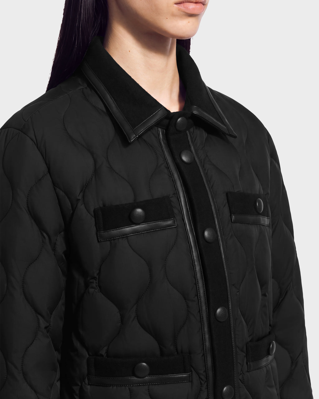 Black JOLIE - 8125036 RUDSAK quilted light down jacket featuring a button-front closure and two chest pockets.