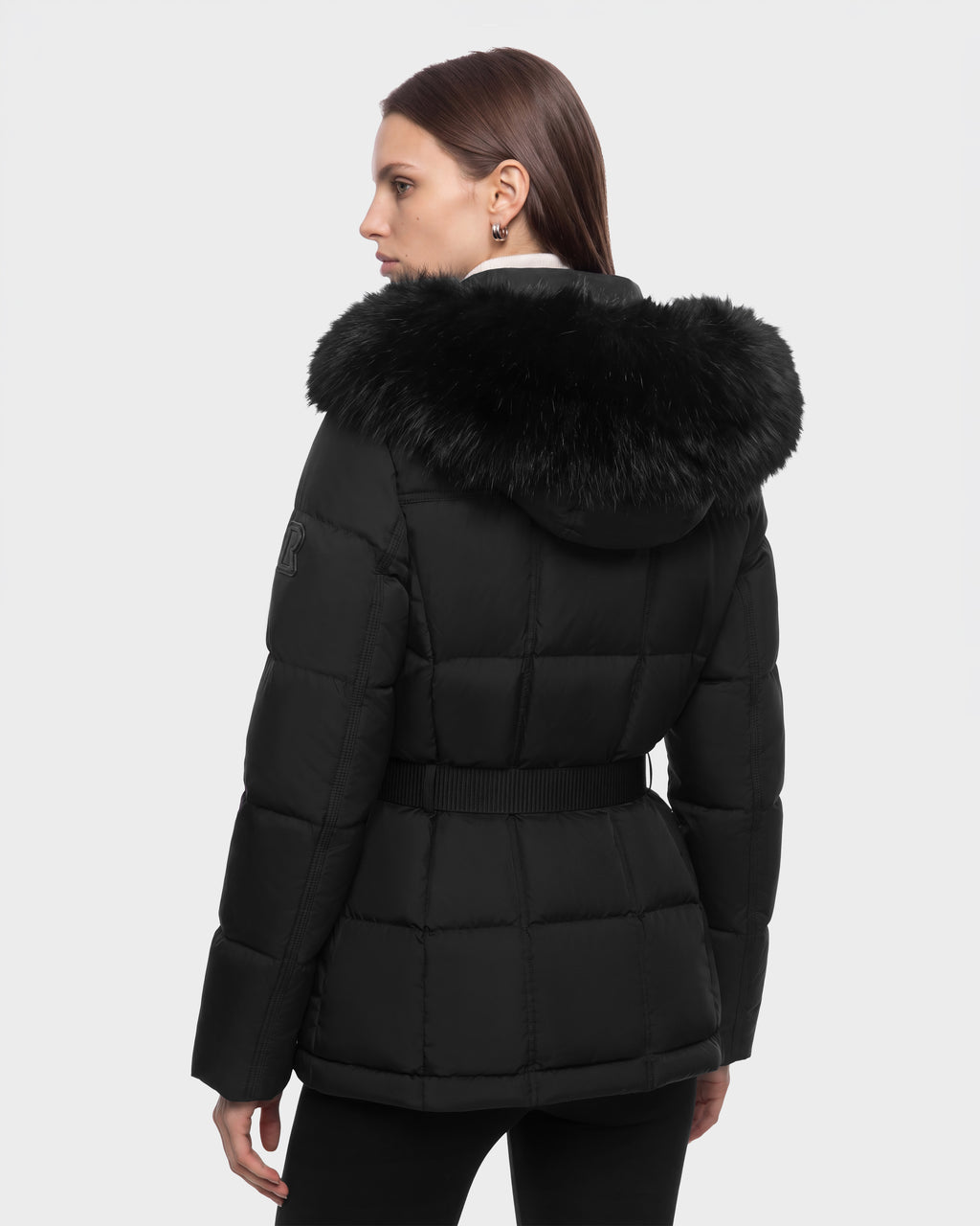 Rudsak GRACE FF - 8126535 Black hooded puffer jacket with a belted waist and a faux fur trim on the hood.