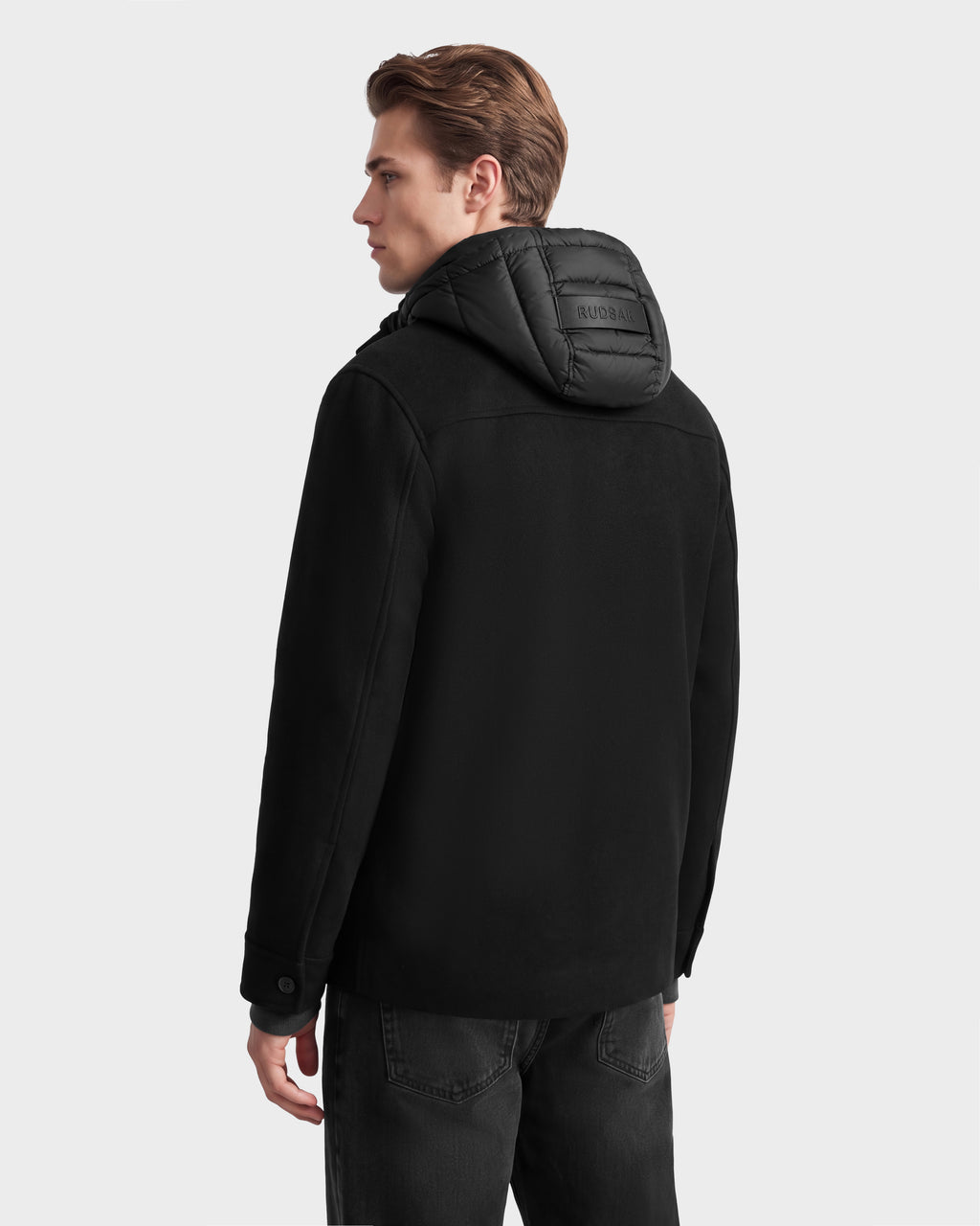 A person seen from the back wearing a charcoal BRUNO - 6126716 wool-blend coat with a quilted hood.
