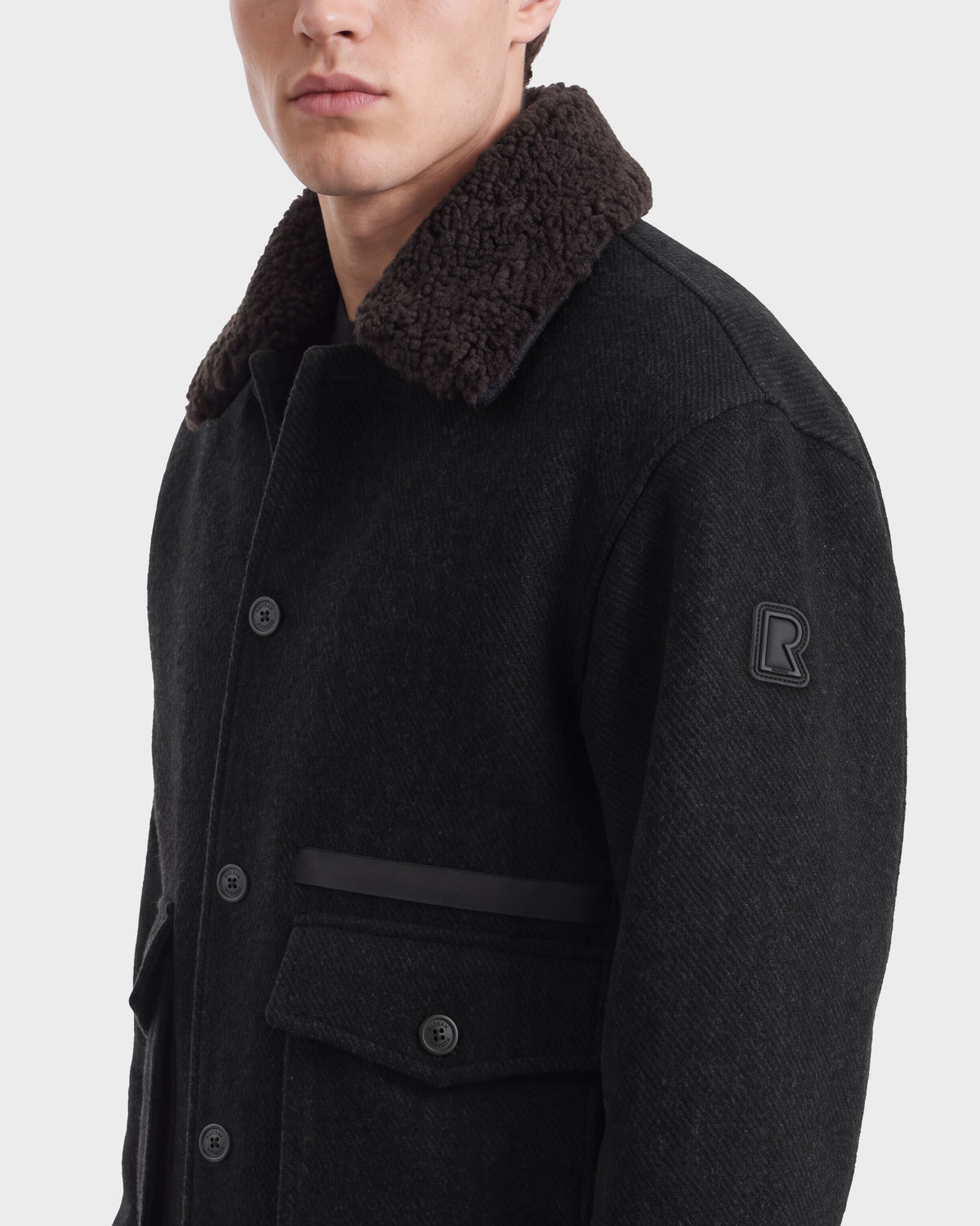 Rudsak JULIUS - 6126723 Charcoal wool-blend jacket featuring a dark brown shearling collar, button closure, and a sleeve patch.