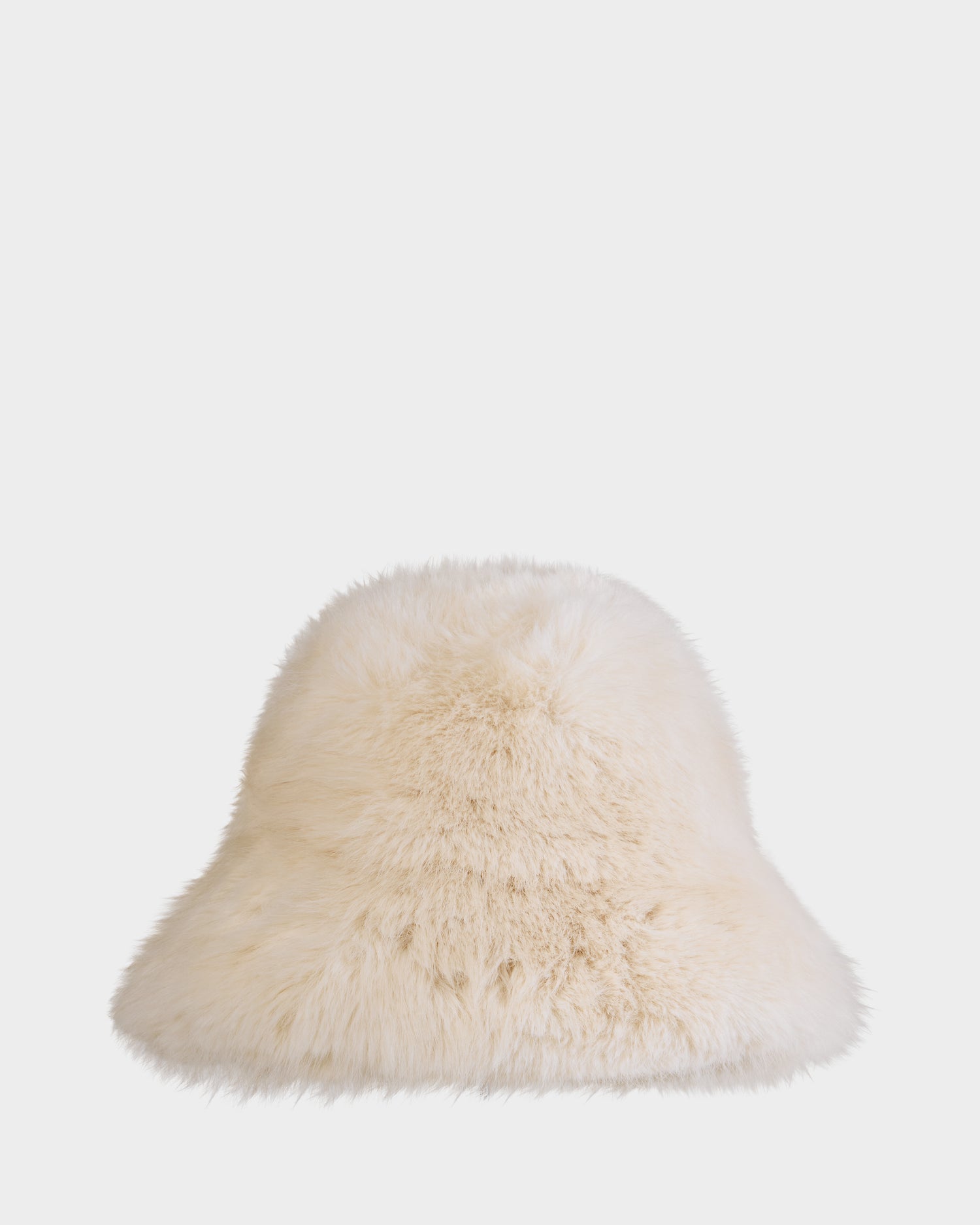 The ROMINA - 8425545 Vanilla by Rudsak is a cream-colored, fluffy faux fur bucket hat, offering cozy-luxe style and warmth—an ideal women’s winter accessory, shown here against a plain white background.