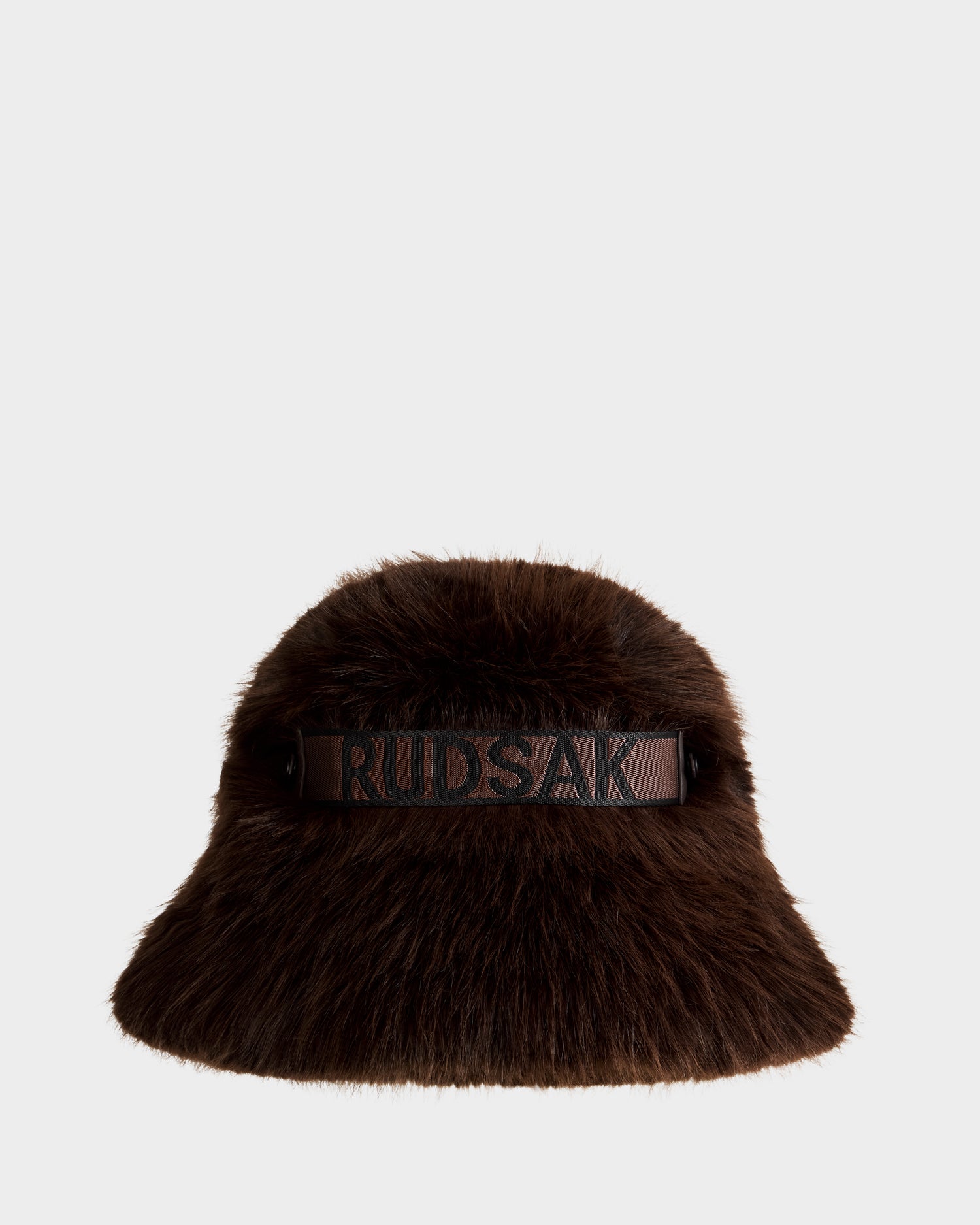 The ROMINA - 8425545 Espresso by Rudsak is a women’s brown faux fur bucket hat with a wide brim and a black Rudsak band, shown against a plain white background—a cozy-luxe winter accessory.