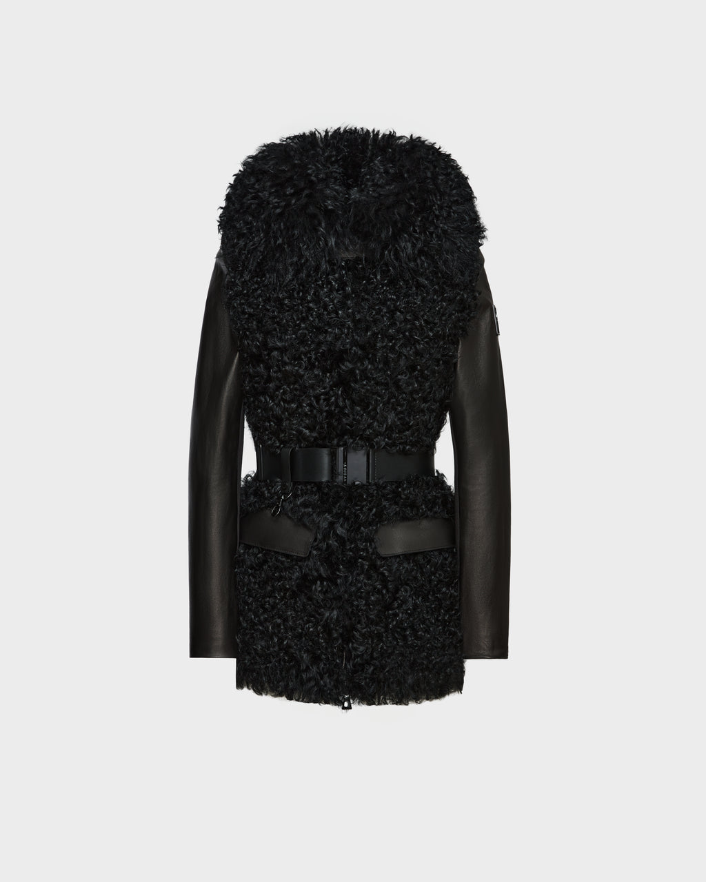 The Rudsak DASHA - 8124809 Black is a women’s leather shearling jacket with curly faux fur on the front and hood, smooth leather sleeves, a wide waist belt, and leather-trimmed pockets, shown on a plain white background.