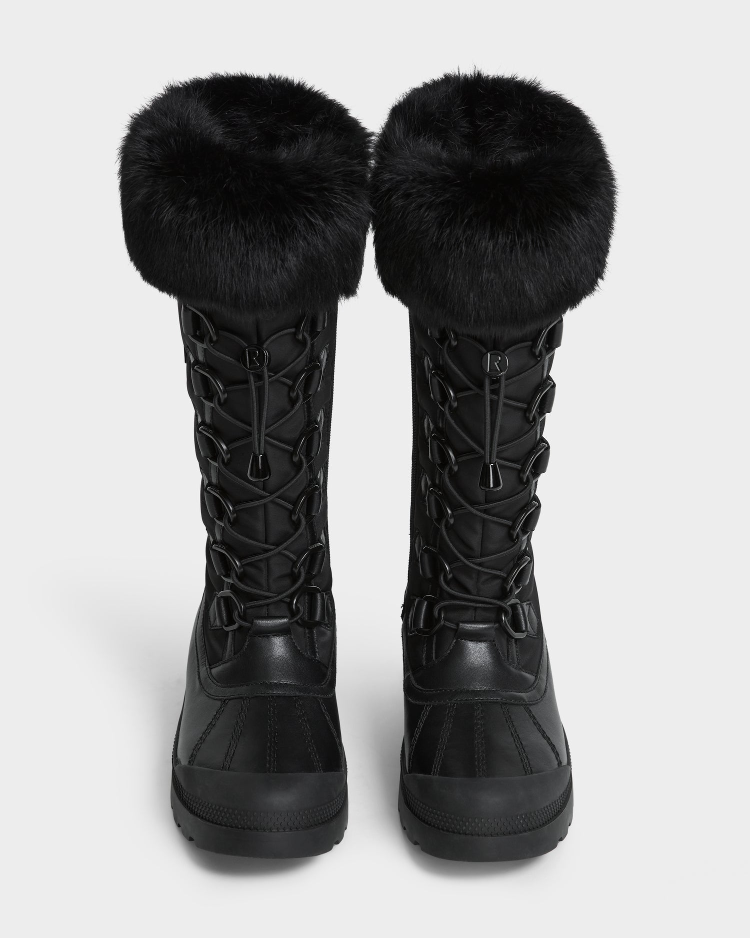 The Rudsak WINDY - L224507 Black womens winter boots feature black faux fur trim, lace-up fronts, and rugged soles for cold-weather comfort, shown from the front on a plain white background.