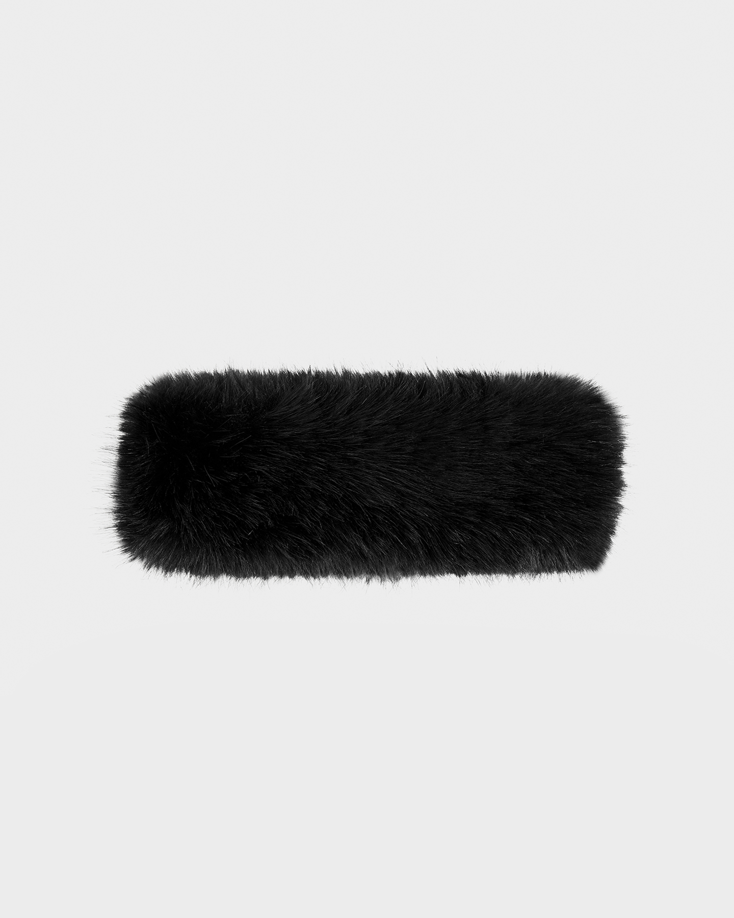 The Rudsak ARLETTE - 8425544 Black is a rectangular faux fur clutch bag with a soft, fluffy texture—perfect as a chic winter accessory—shown against a plain light gray background.