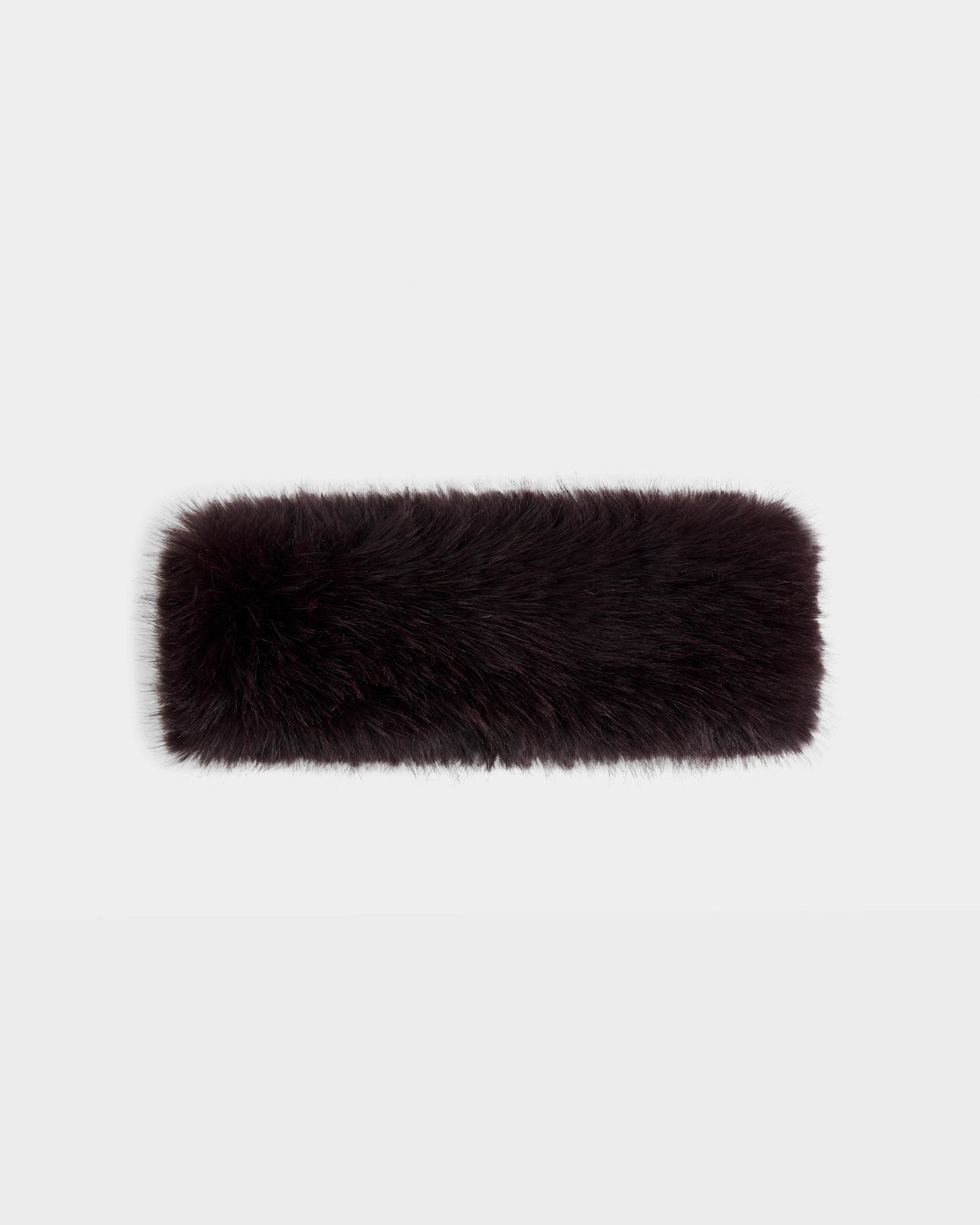 The Rudsak ARLETTE - 8425544 Bordeaux is a rectangular, dark brown women’s faux fur headband with a fluffy texture, perfect for chic winter style, shown against a plain white background.