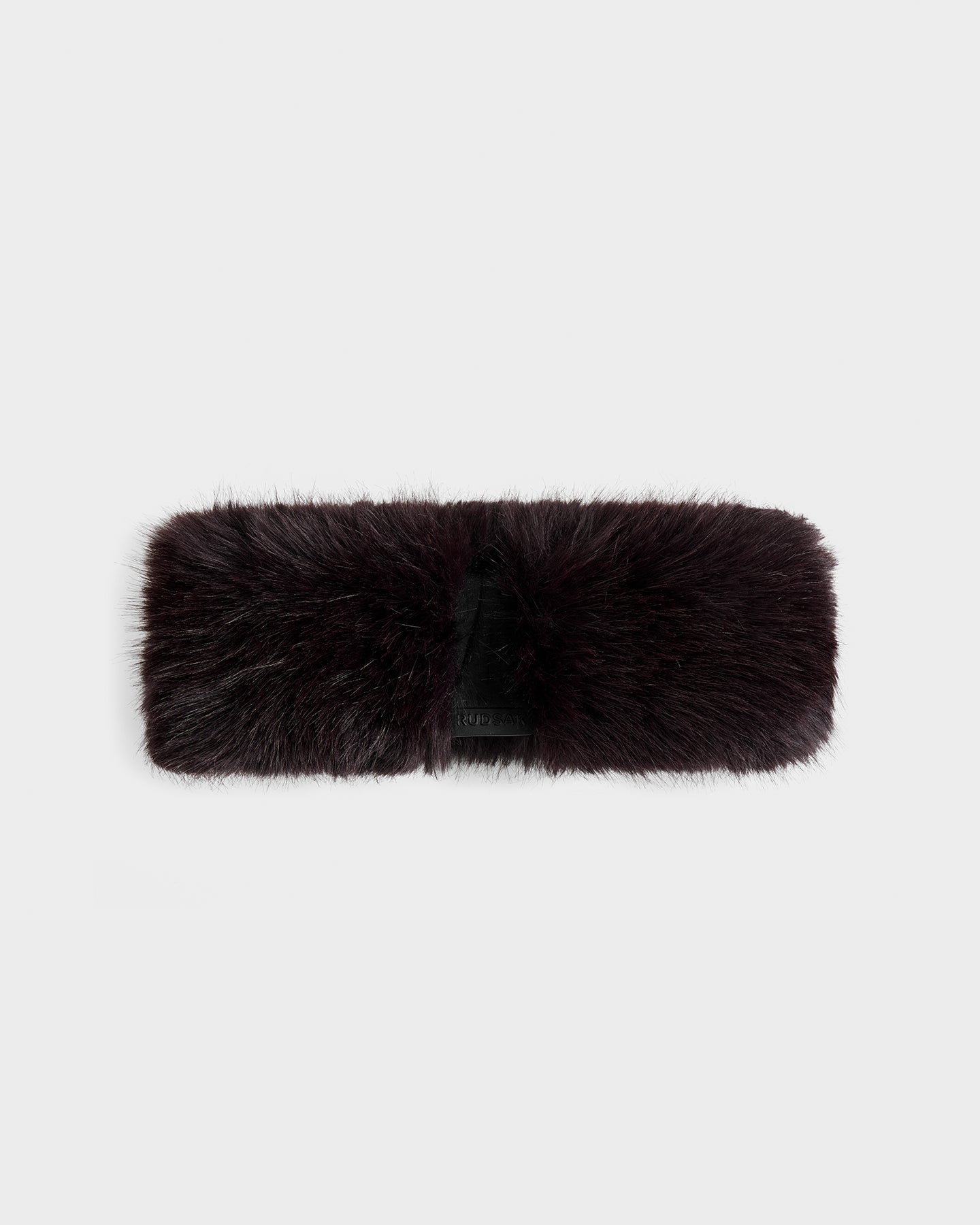 The ARLETTE - 8425544 Bordeaux by Rudsak is a chic women’s faux fur headband in dark brown with a soft, fluffy texture—perfect for winter fashion, shown on a plain white background.