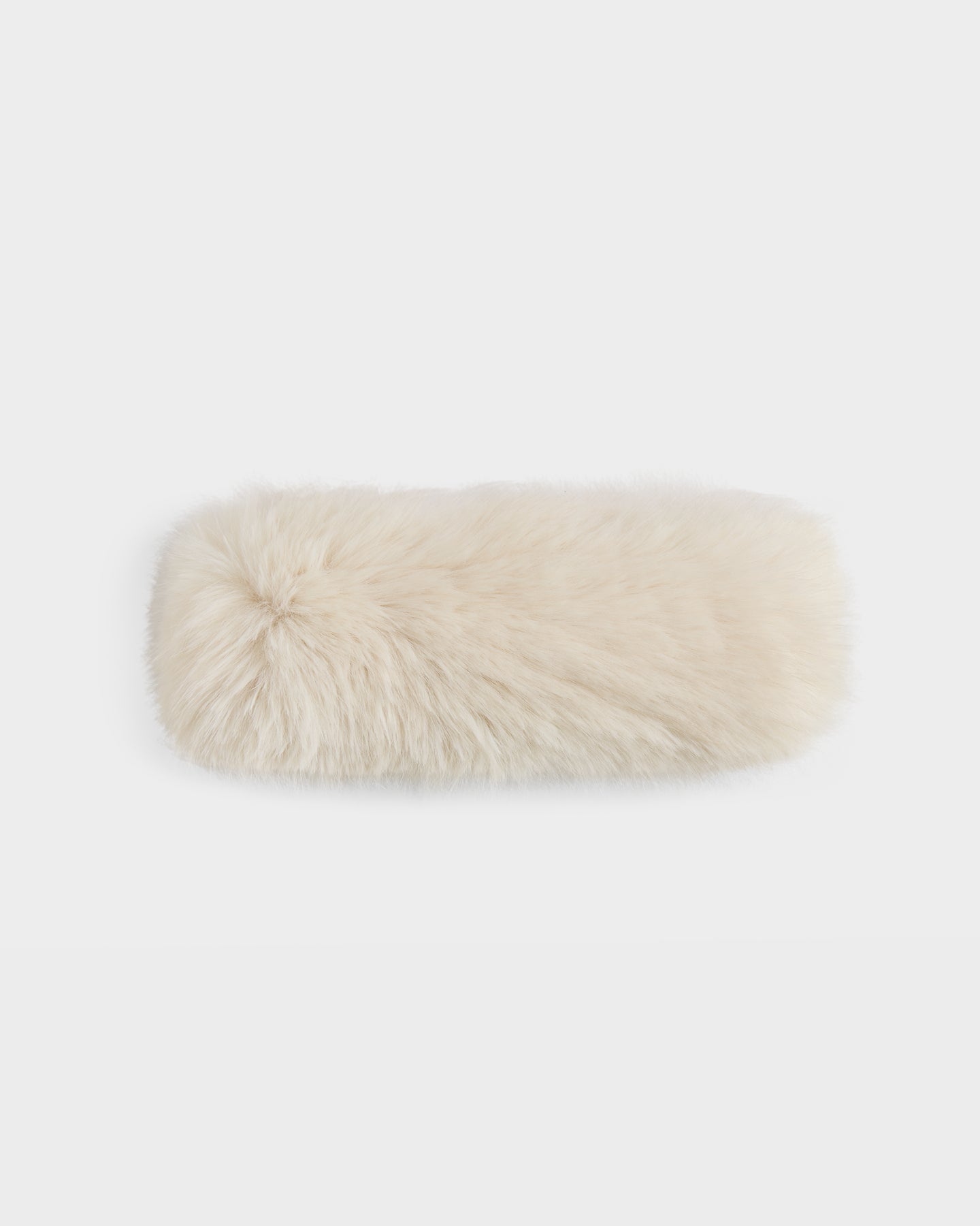 The Rudsak ARLETTE - 8425544 Vanilla is a fluffy, cream-colored rectangular faux fur muff—an ideal winter accessory—shown on a plain white background.