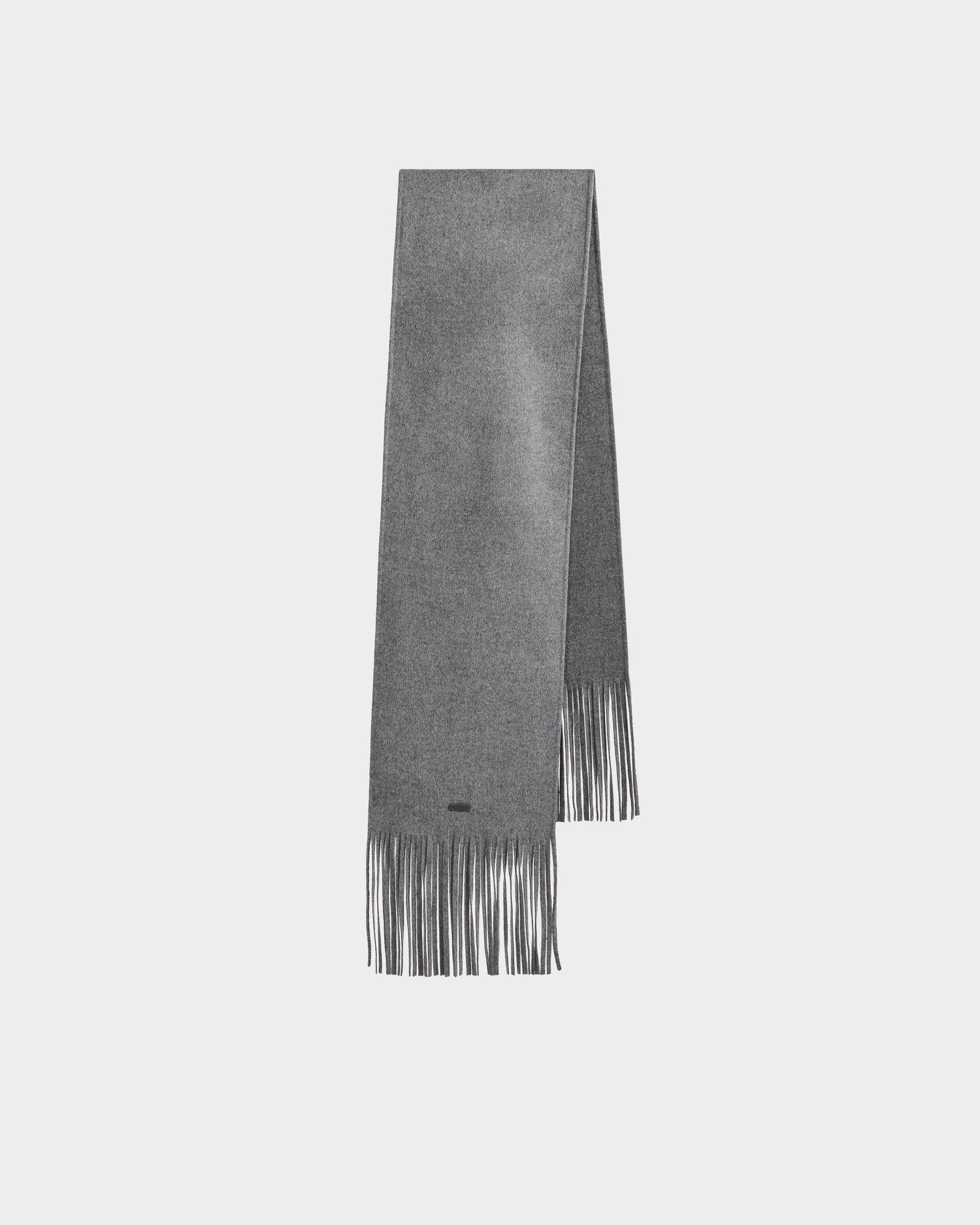 The Rudsak CALEN - 8425532 Grey scarf is a long, light gray unisex wool-blend accessory with fringed ends—an ideal cold-weather essential.