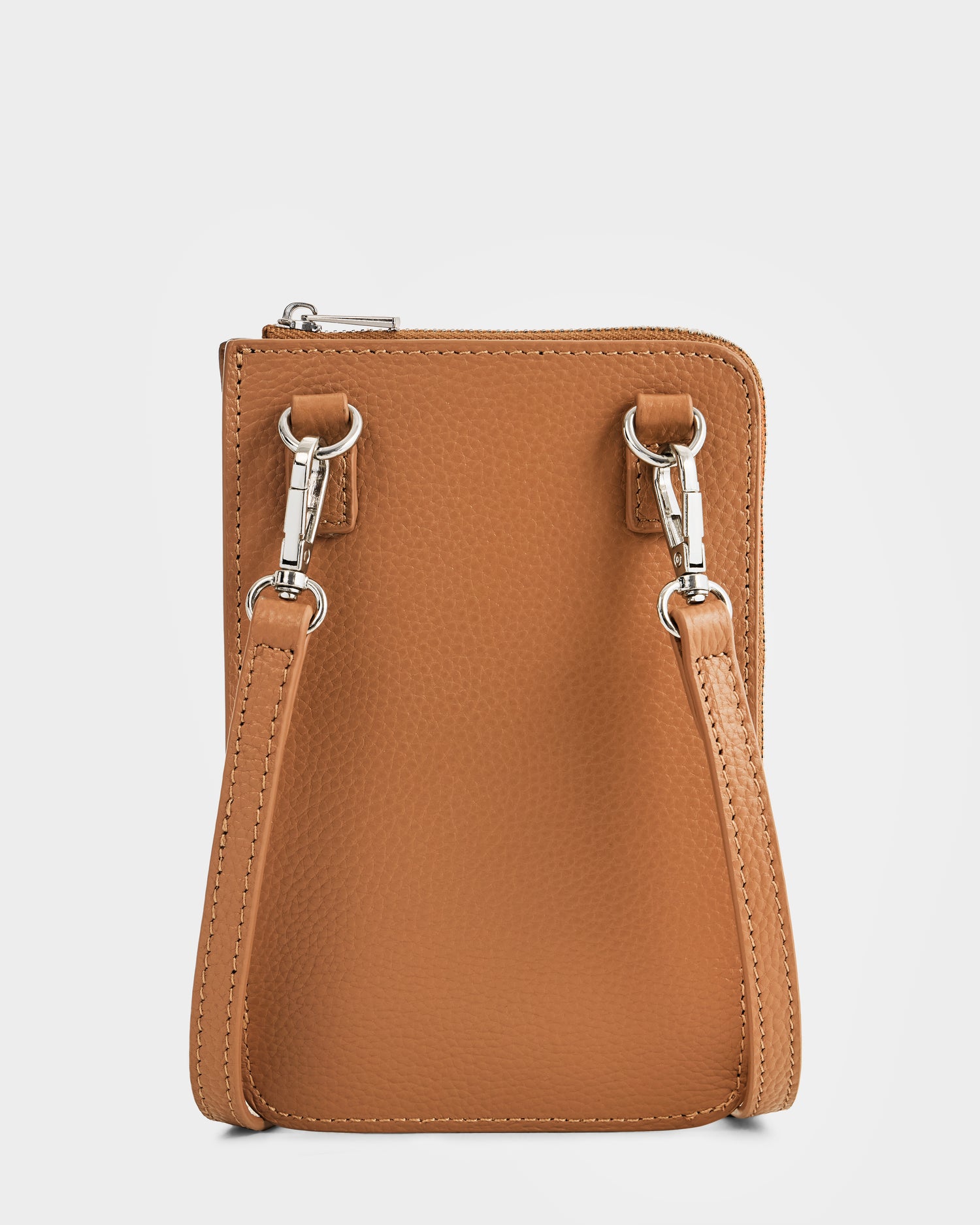 The Rudsak CELYN - L325514 Taupe is a women’s tan pebbled leather city bag with two adjustable straps and silver clasps, shown from the back on a white background. Stylish and functional, it's ideal for everyday crossbody use.