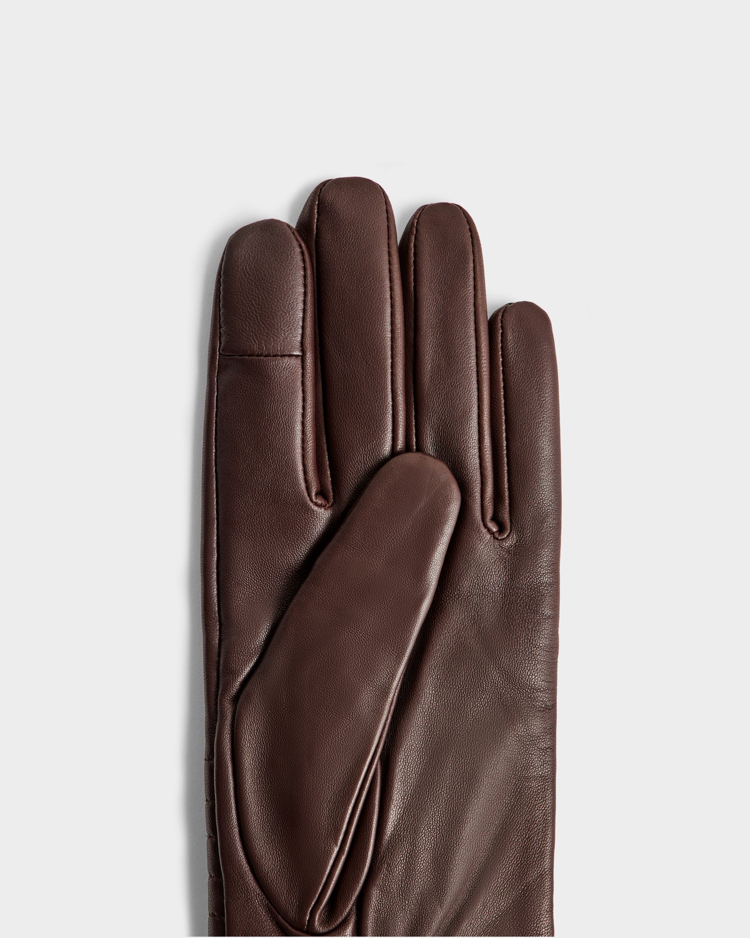 The Rudsak GEMMA - 8425008 Espresso brown leather glove is shown with palm up and fingers extended against a light gray background, making it a stylish winter accessory.