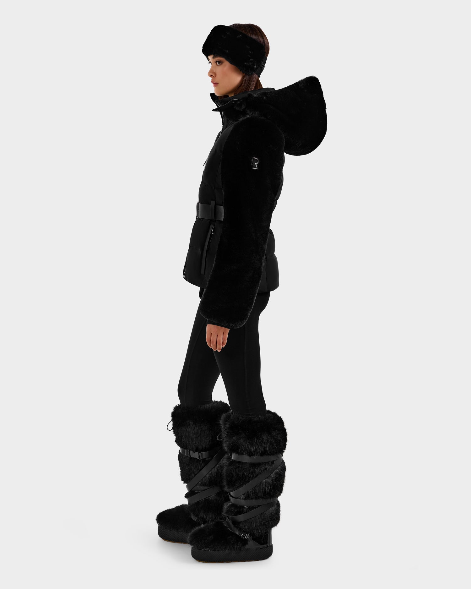 A woman wearing the Rudsak JOANNA F - 8125593 black women's down ski jacket.