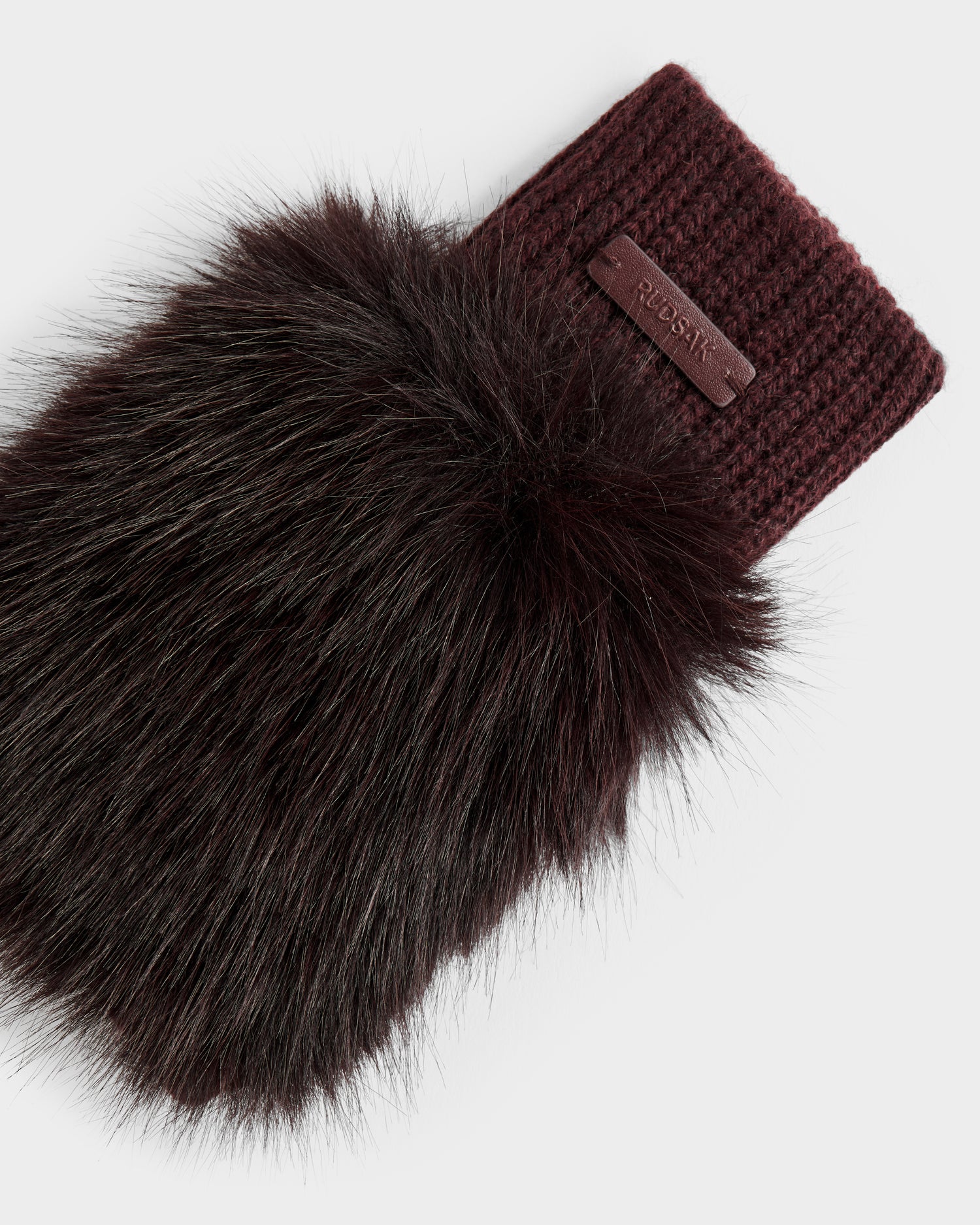 The Rudsak LIA - 8425007 Bordeaux mitten is a burgundy wool-blend knit with a plush matching faux fur cuff and a small Rudsak label on the ribbed section.