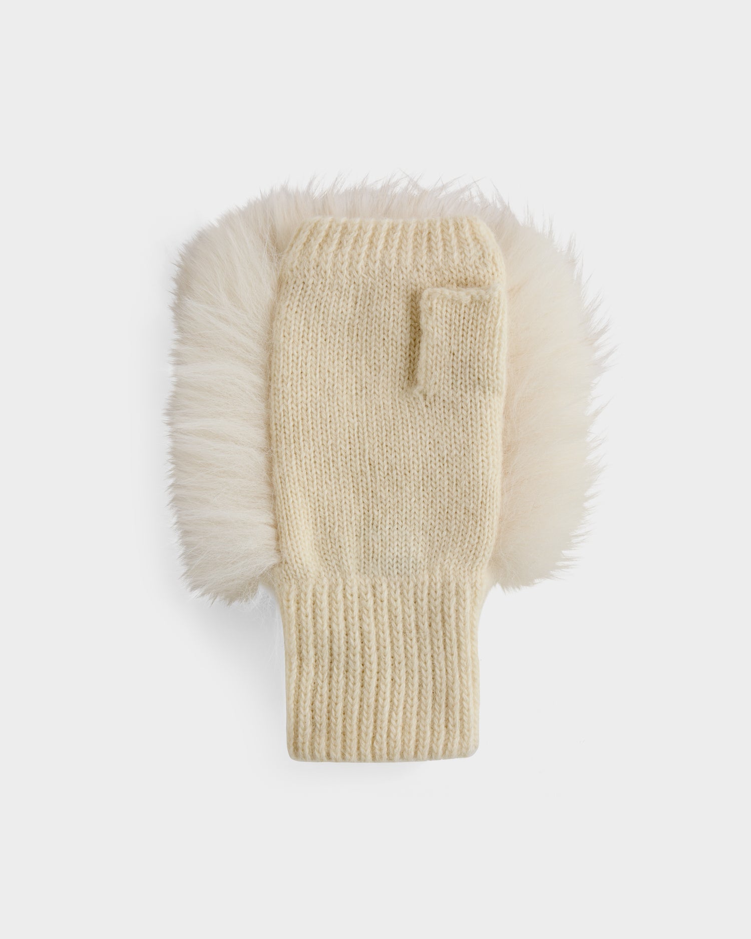The LIA - 8425007 Vanilla by Rudsak is a cream women’s fingerless mitten, crafted from a wool-blend knit with wide fluffy faux fur trim along the sides, shown flat on a white background.