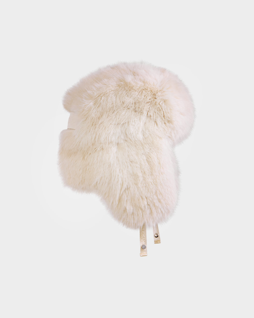 The Rudsak LIRA - 8425024 Vanilla is a women’s fluffy, light beige faux fur aviator hat with ear flaps and beige straps, perfect for après-ski style and winter warmth, shown on a plain white background.