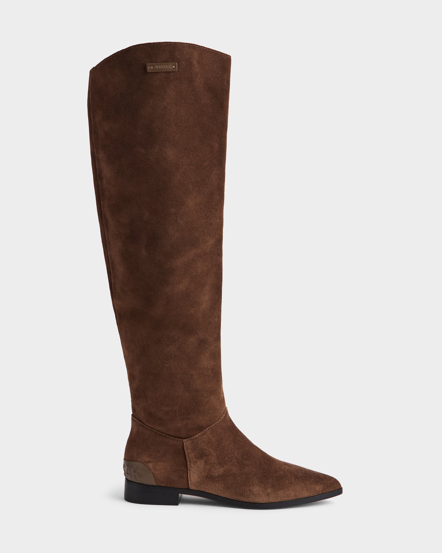 The MARSALLA - 8225033 Mocha by Rudsak is a knee-high, brown women’s suede boot with a flat heel and metallic logo plate near the top, elegantly displayed against a plain white background—perfect for any occasion.