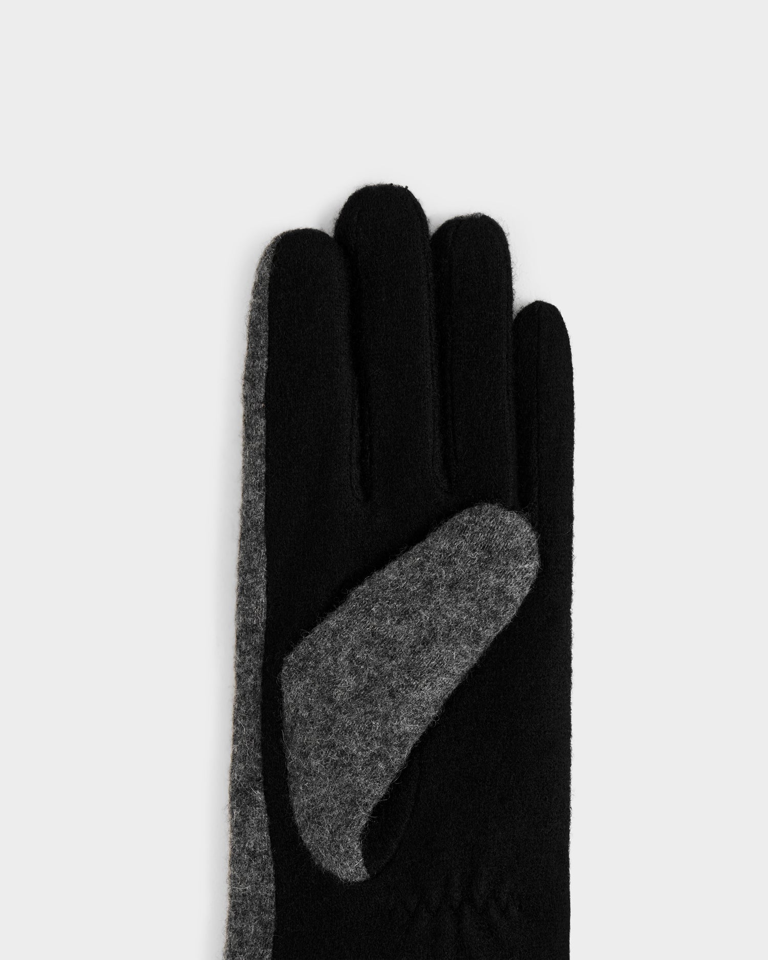 A close-up of Rudsak OLGA - L425541 Grey women's wool gloves with a gray palm patch and soft wool-cashmere lining, shown against a plain light background.