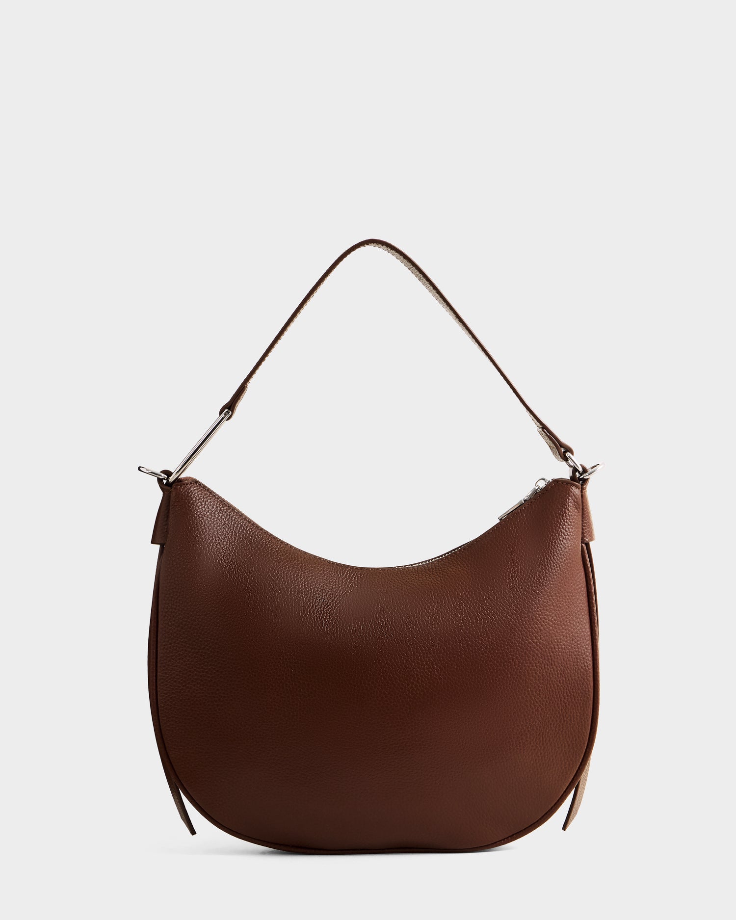 The Rudsak SYLVIA - L325515 Mocha is a brown leather crescent silhouette bag with a single short strap and curved body, showcased against a plain white background.