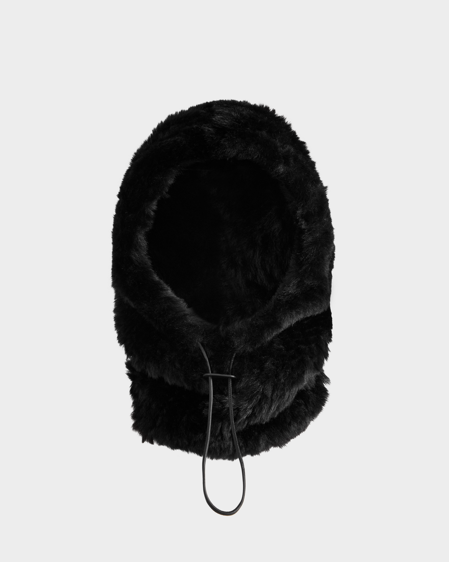 The TARA - 8425025 Black by Rudsak is a women's faux fur balaclava featuring a soft, plush texture and drawstring front closure—an elegant winter accessory shown against a white background.