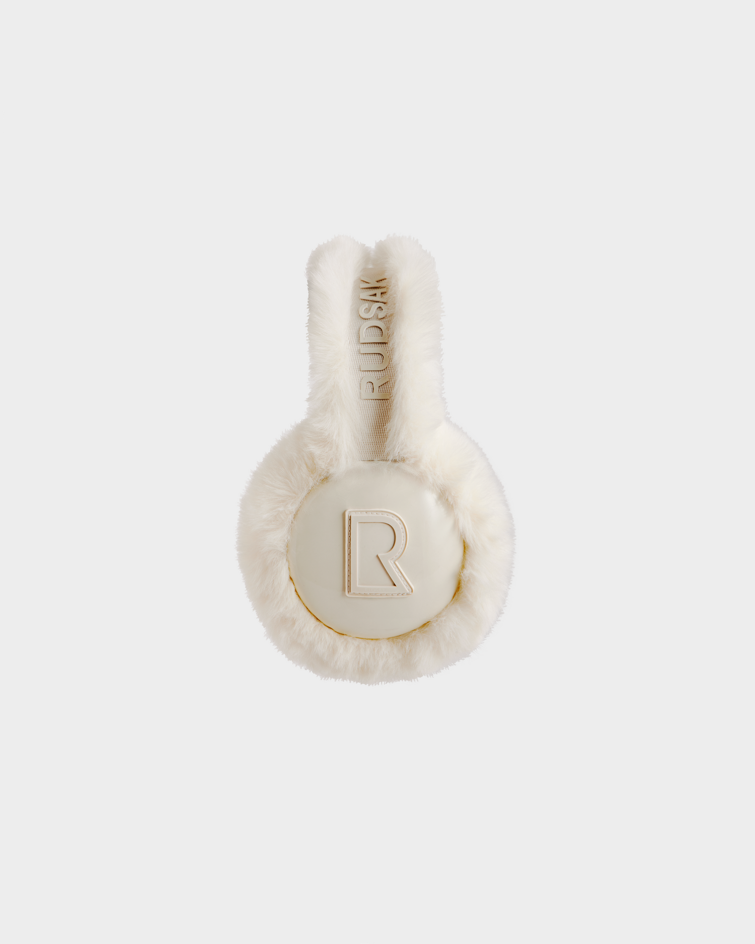 The Rudsak VALENCIA - 8425543 Iceland earmuffs feature white faux fur, playful bunny ears with gold accents, a bold letter R on each ear cover, and "RUDIS" embroidered on the headband—your perfect winter accessory.