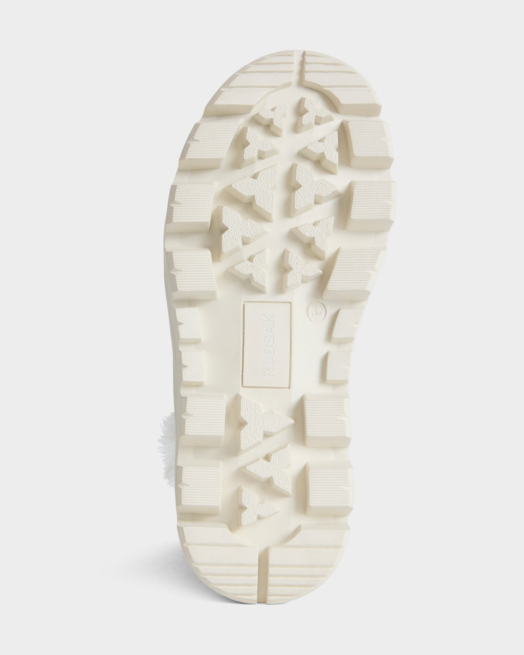 Off-white lugged rubber sole of the OMBRE - 8226513 Vanilla boot featuring a geometric tread pattern.