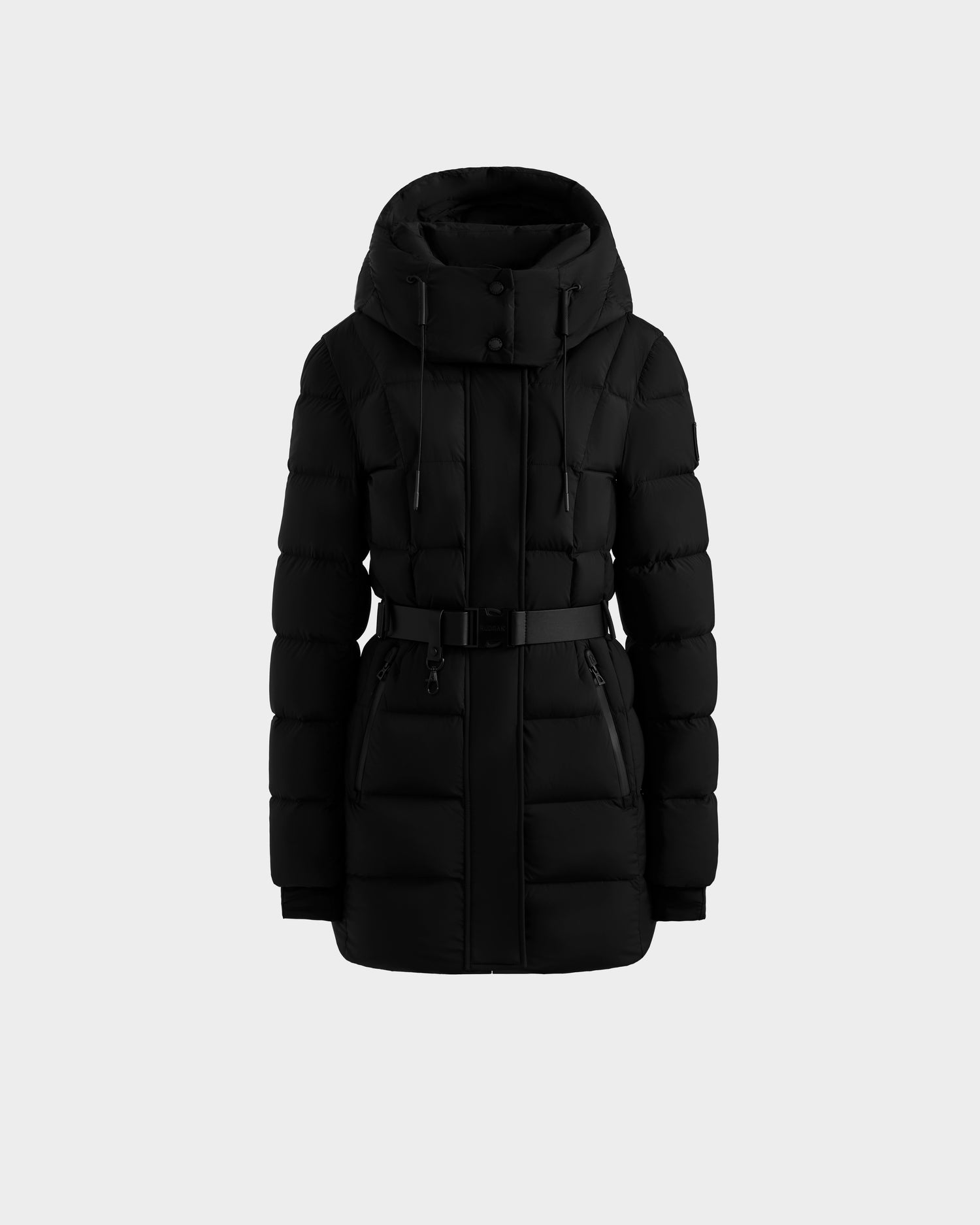 The Rudsak FRIDA M-M - L125607 Black women’s down puffer features a quilted design, hood, front zipper with snap buttons, two zip pockets, long sleeves, and a matching waist belt. Displayed on a plain light gray background.