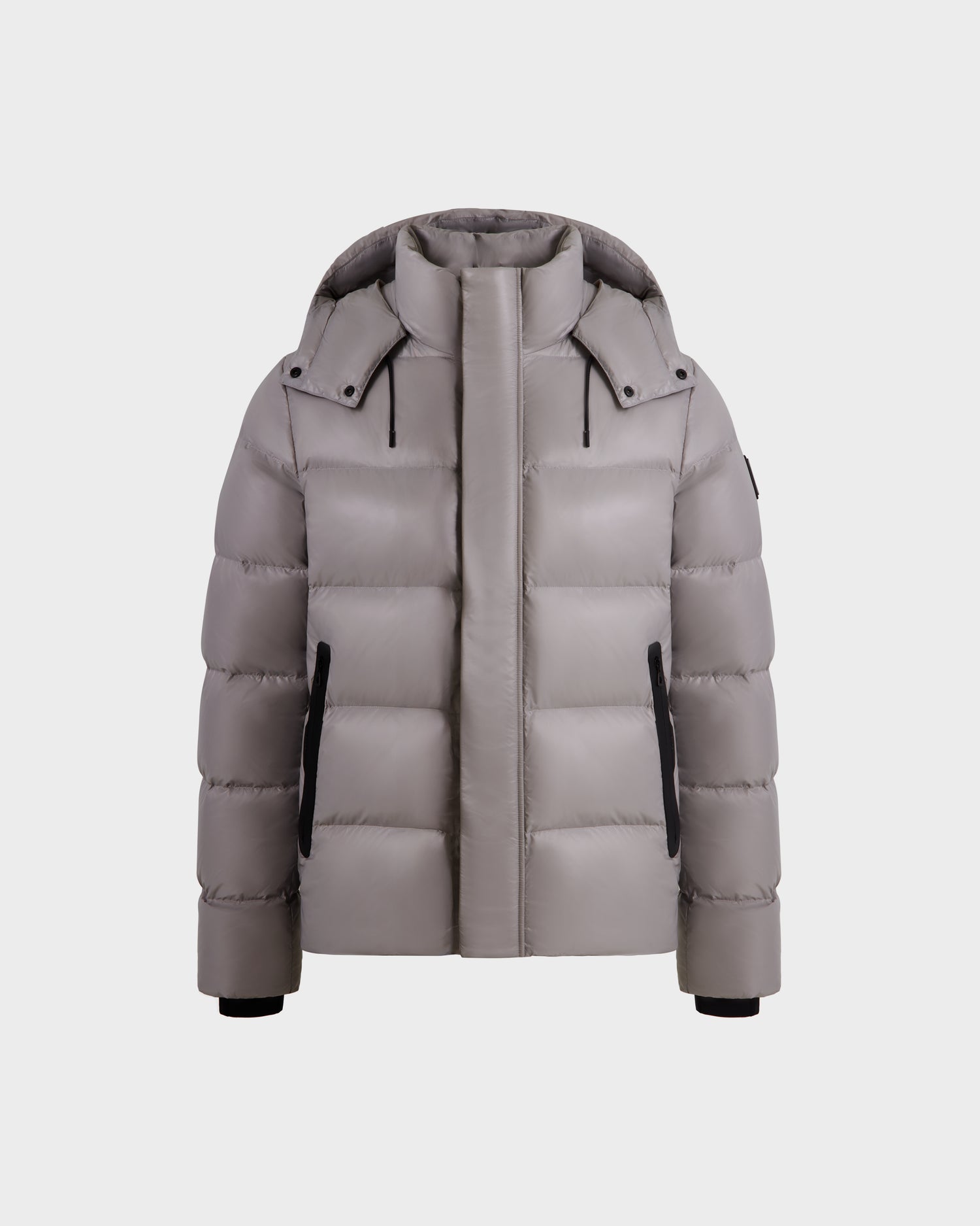 The Rudsak JOEL S - 6124606 Light Grey puffer jacket features a detachable hood, black zippered side pockets, and black trim on the cuffs—premium winter outerwear shown on a white background.