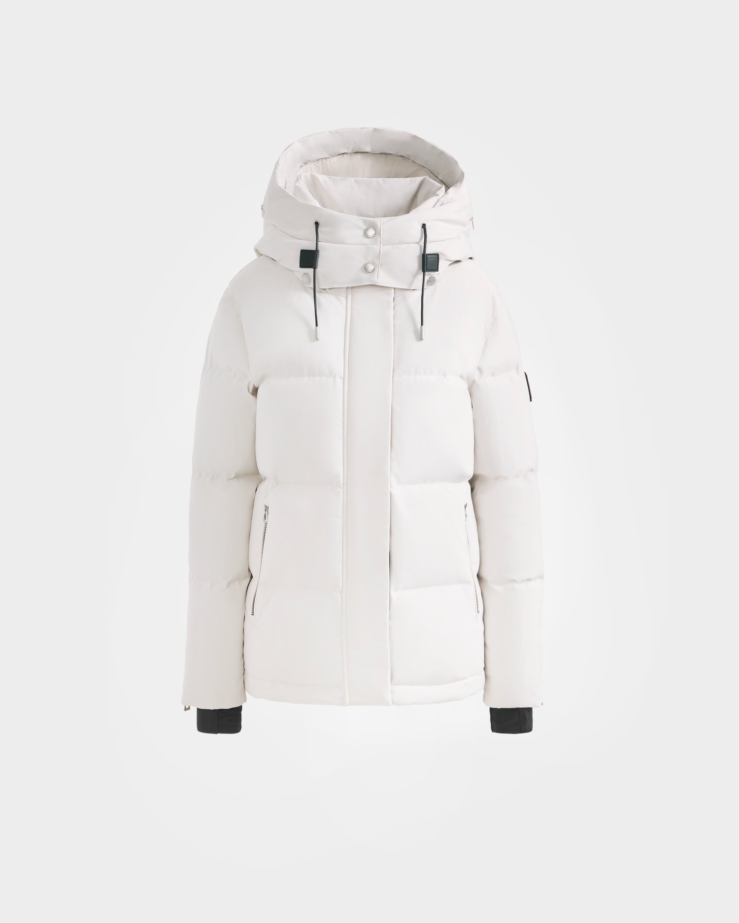 The Rudsak JOON H - 8125586 Vanilla women's down jacket in white features RDS-certified down, a hood, front zipper, snap buttons, and black drawstrings, displayed on a plain white background.