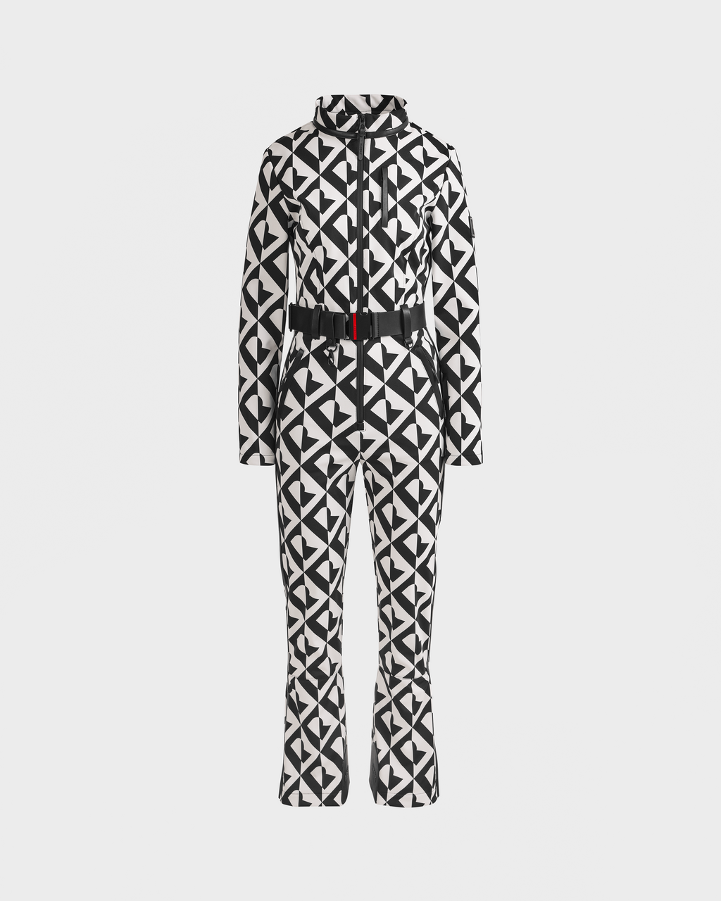 The JOSIE - 8124817 Vanilla Monogram by Rudsak is a black and white geometric one-piece ski suit with a front zipper, high collar, long sleeves, flared legs, and a black waist belt, shown on a plain white background.