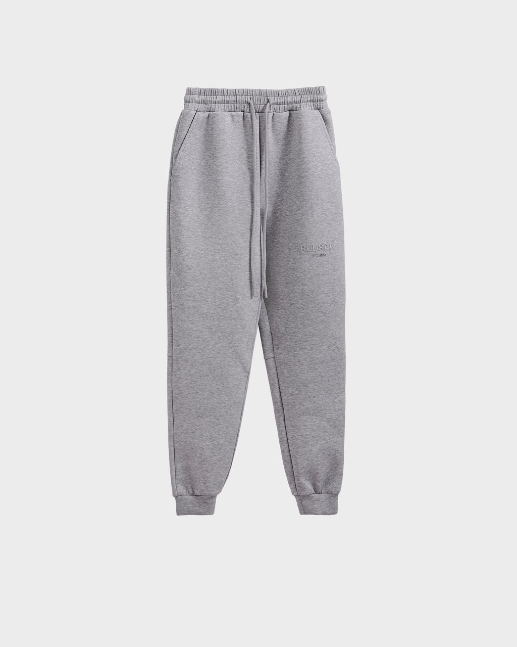 The Rudsak JOSS - 9524009 Heather Grey W joggers feature premium cotton, an elastic waistband with drawstring, side pockets, and cuffed ankles, shown against a plain white background.